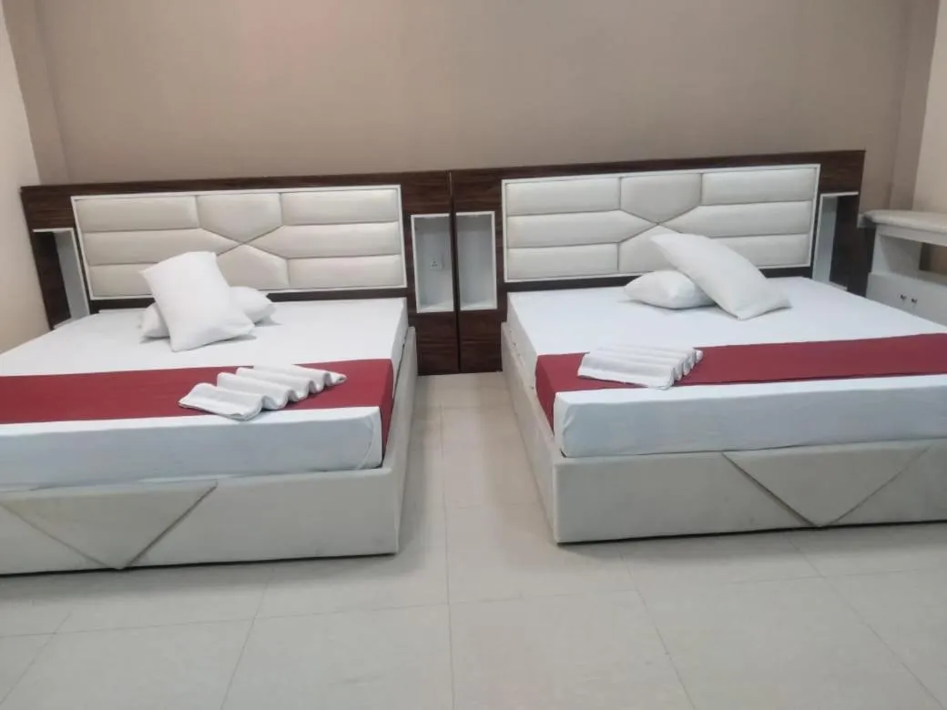 Bed in Gnaanams Hotel and Restaurant