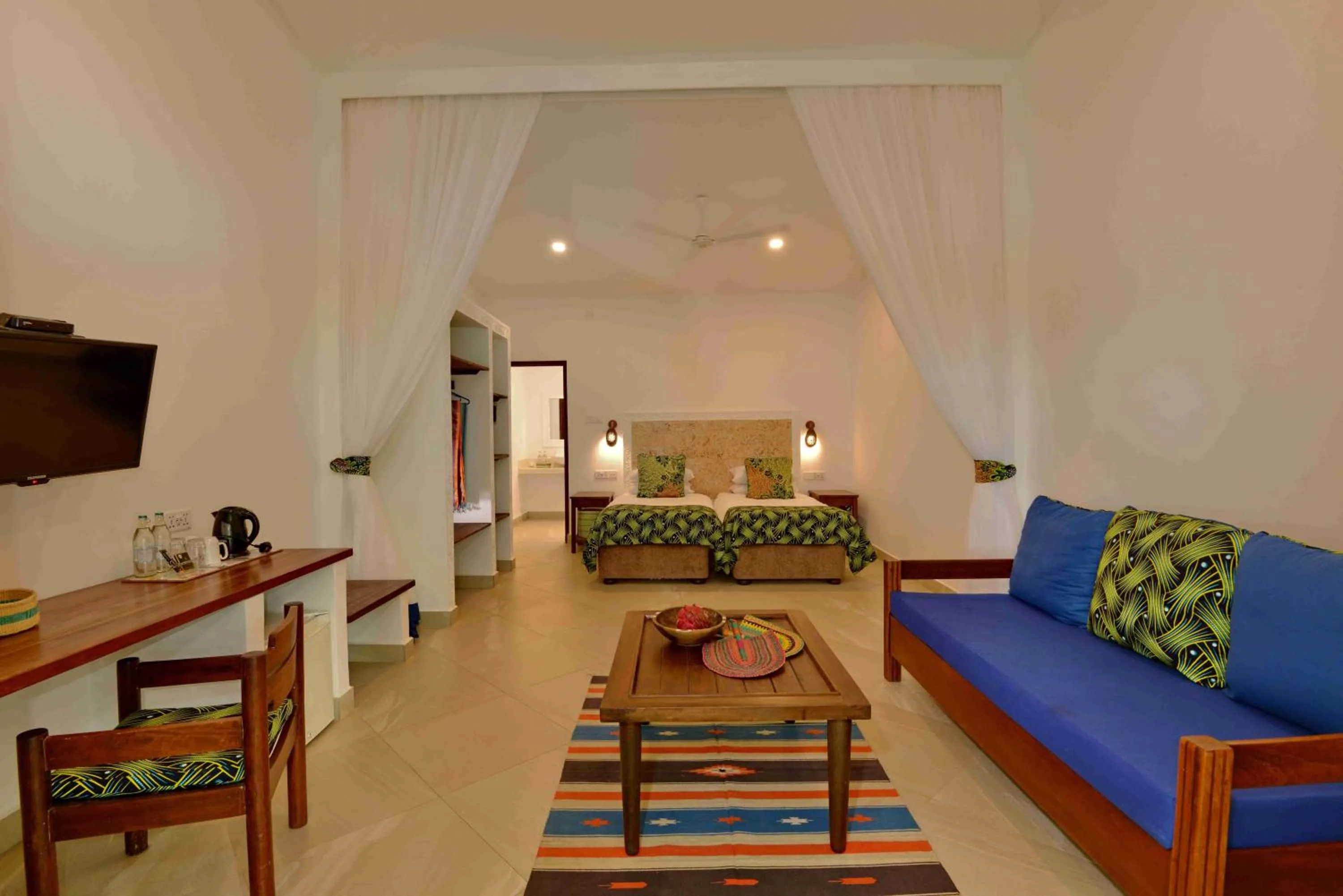 Seating area, Bed in Mnarani Beach Club