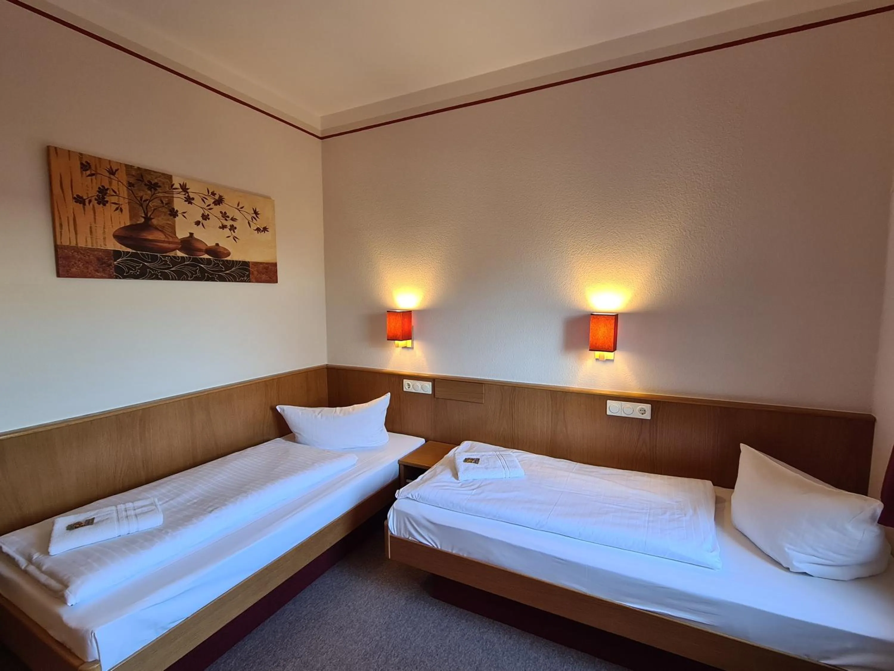 Photo of the whole room, Bed in Hotel Brauhaus Wittenberg
