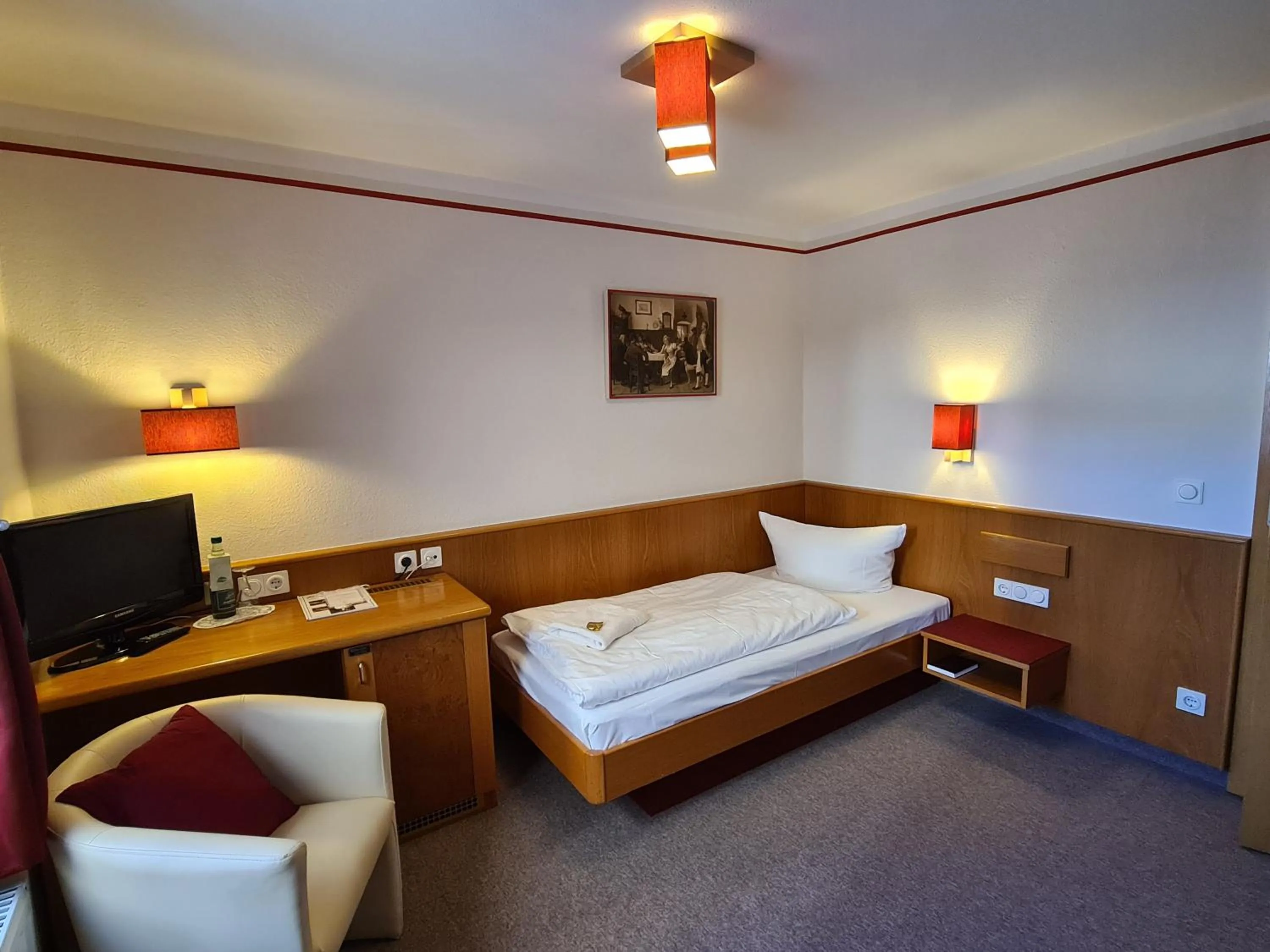 Photo of the whole room, Bed in Hotel Brauhaus Wittenberg