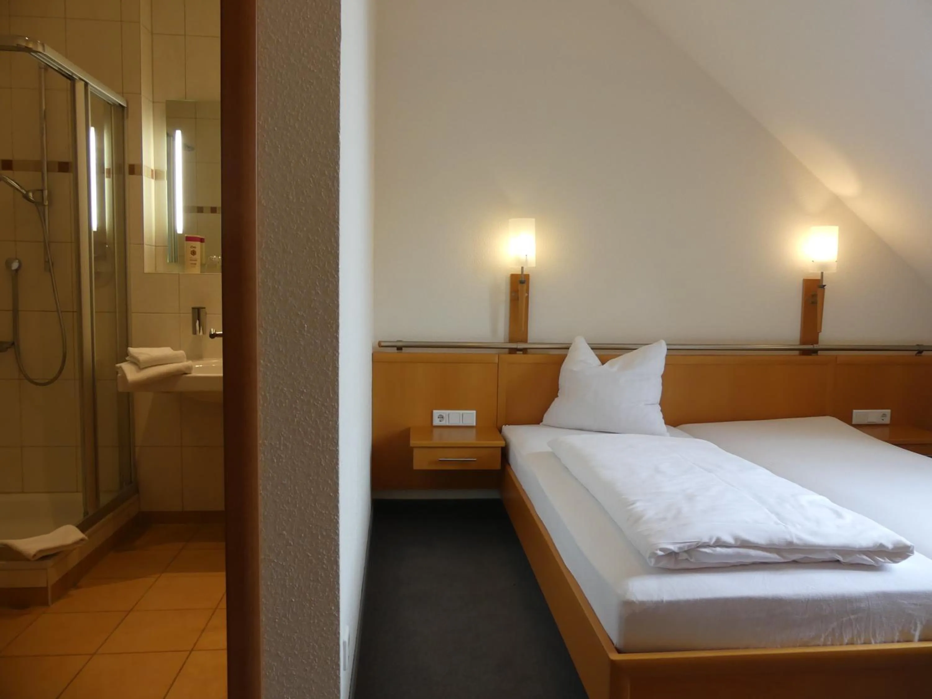 Photo of the whole room, Bed in Landgasthaus Hotel Eggert