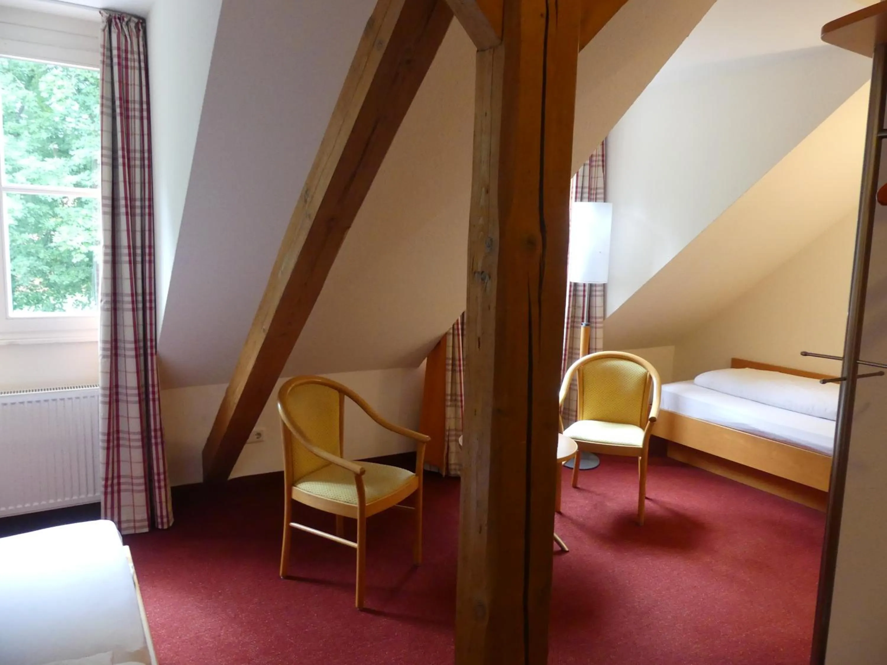 Photo of the whole room, Bed in Landgasthaus Hotel Eggert