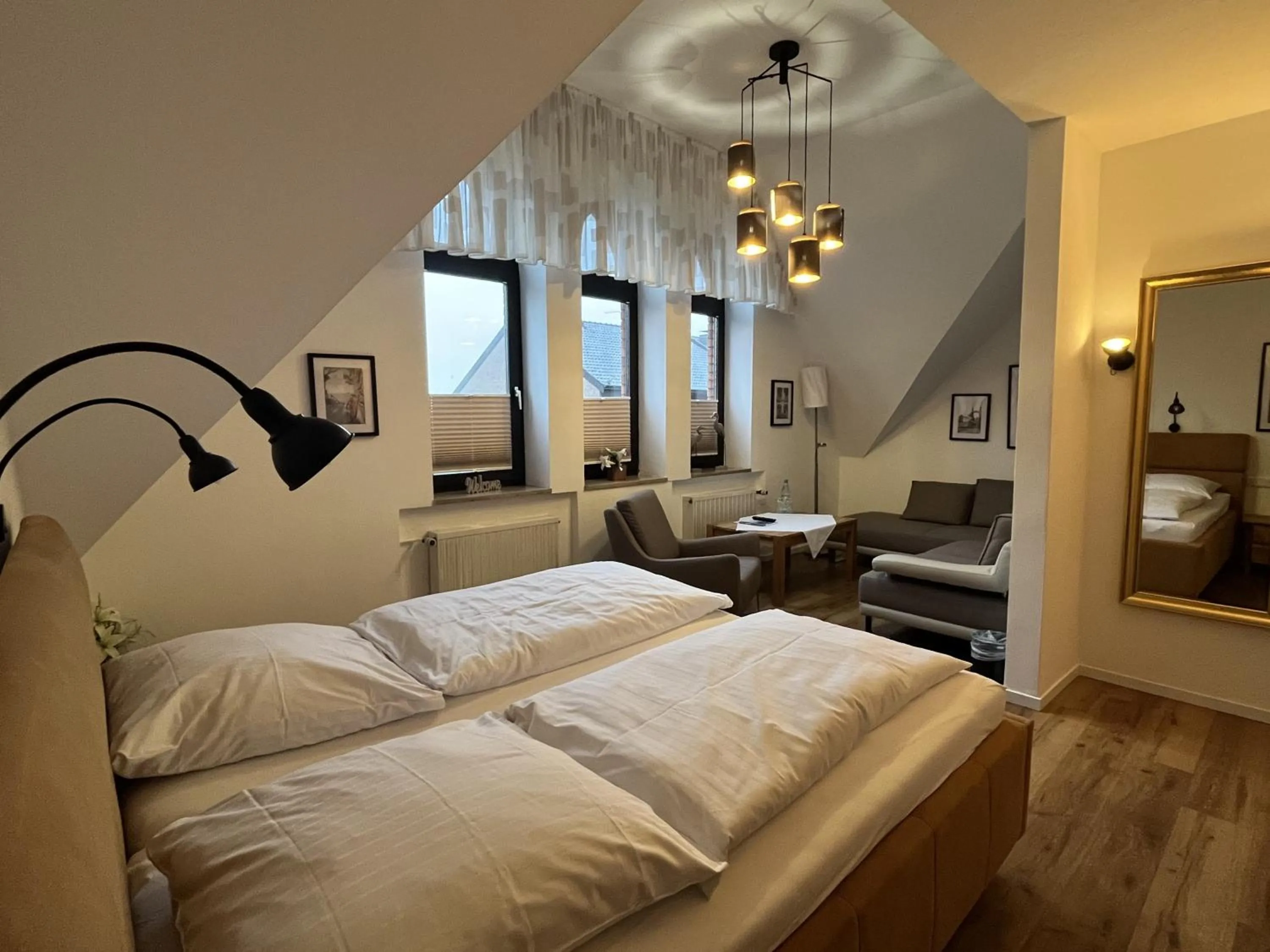 Seating area, Bed in Hotel Wolfsjäger