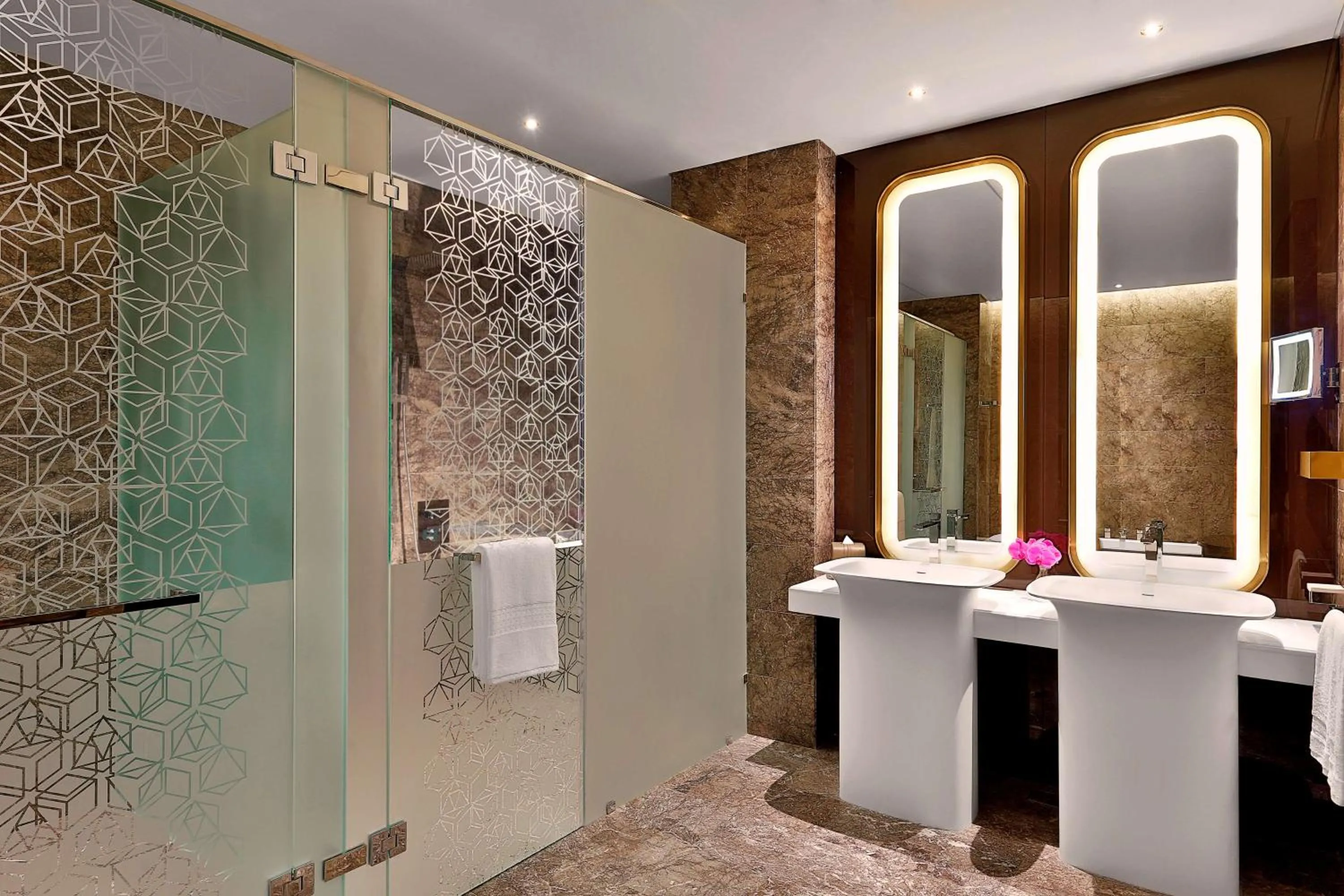 Bathroom in AlRayyan Hotel Doha, Curio Collection by Hilton