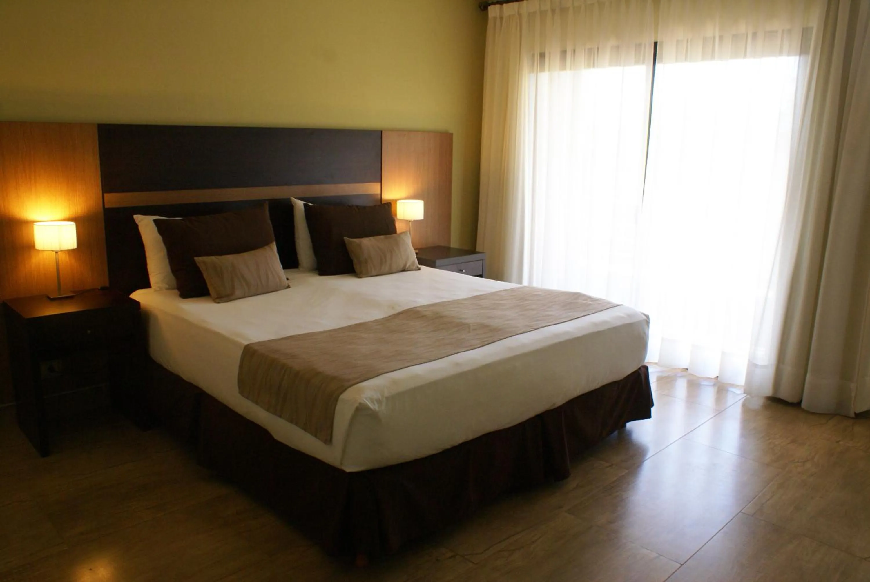 Bed in Pirayu Hotel & Resort