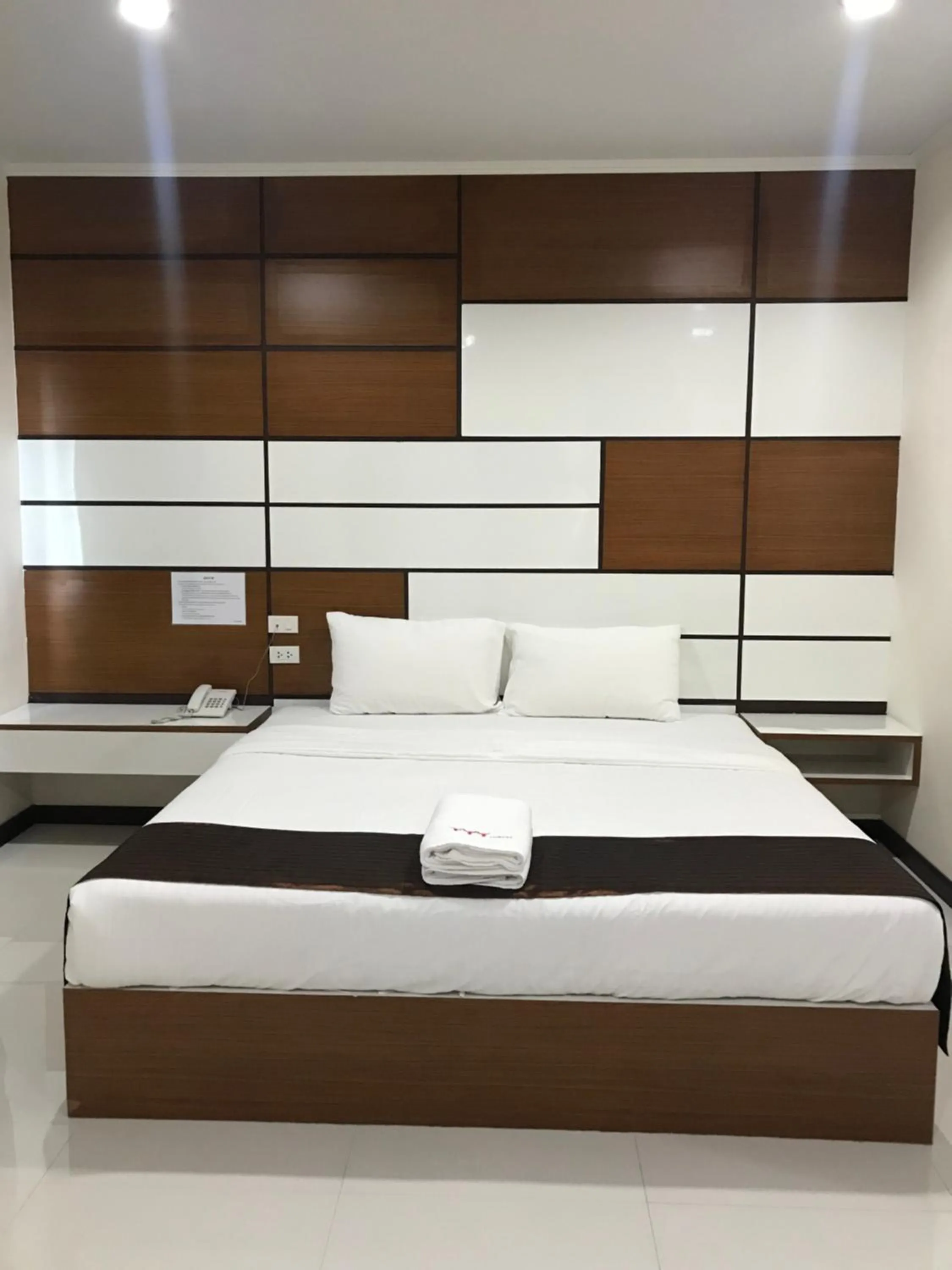 Bed in TTT Hotel