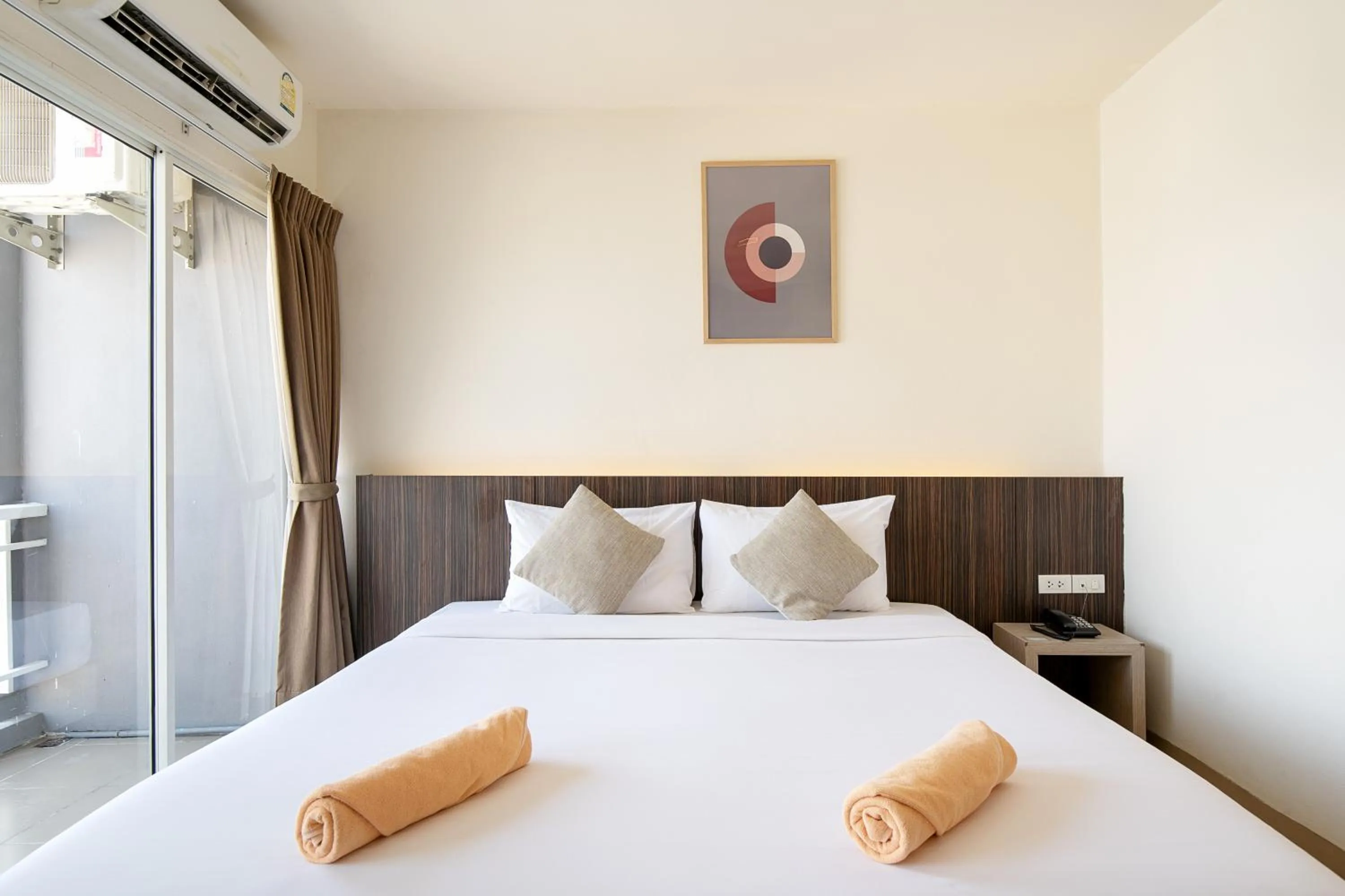 Bed in Leenova Hotel