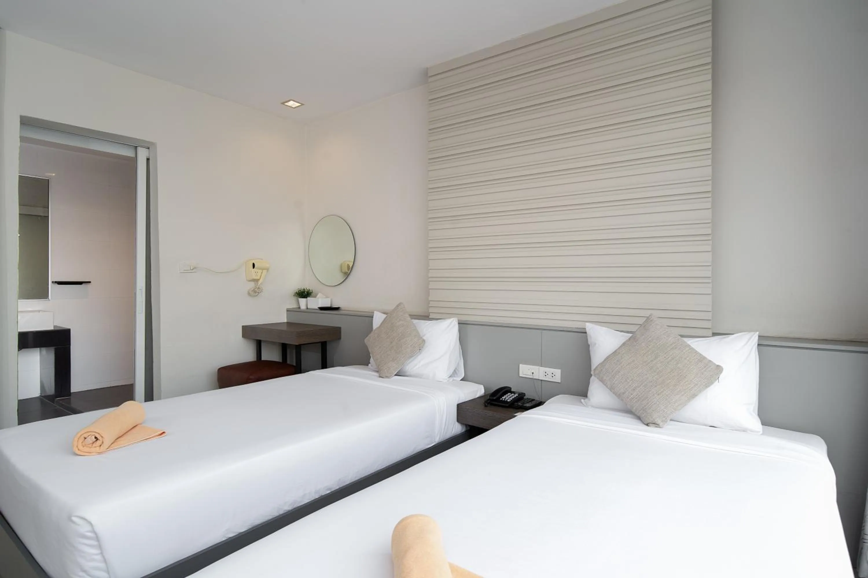 Bed in Leenova Hotel