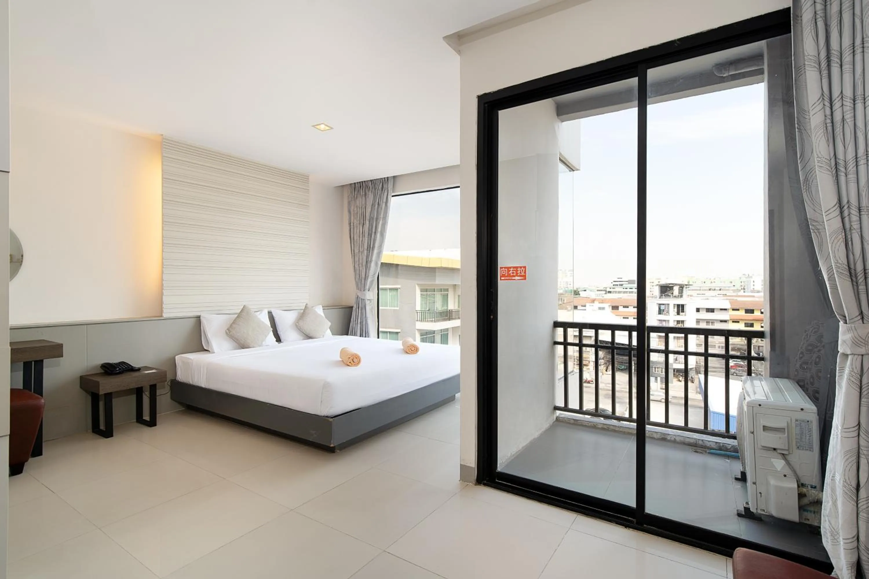 Bed in Leenova Hotel