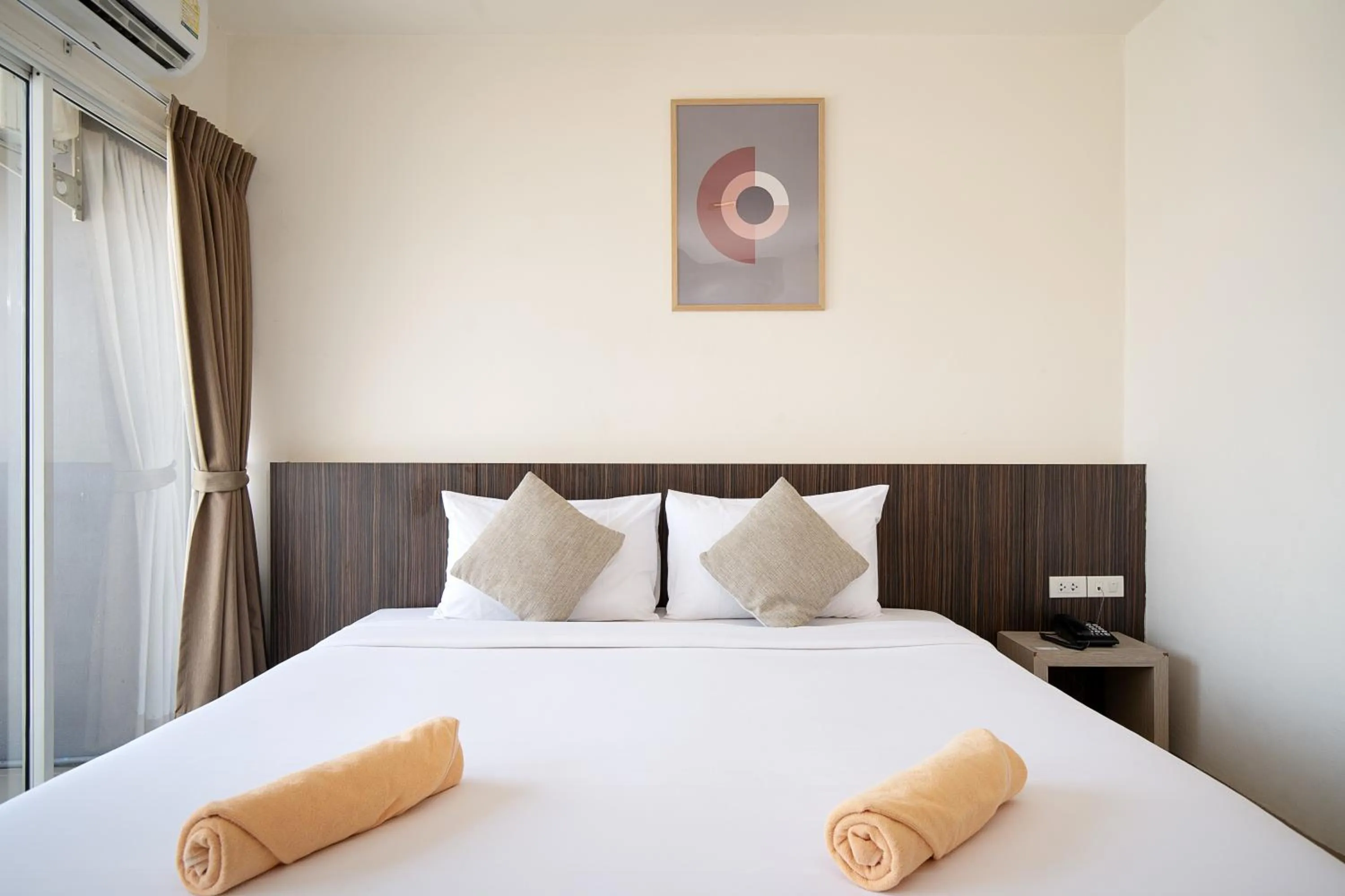 Bed in Leenova Hotel