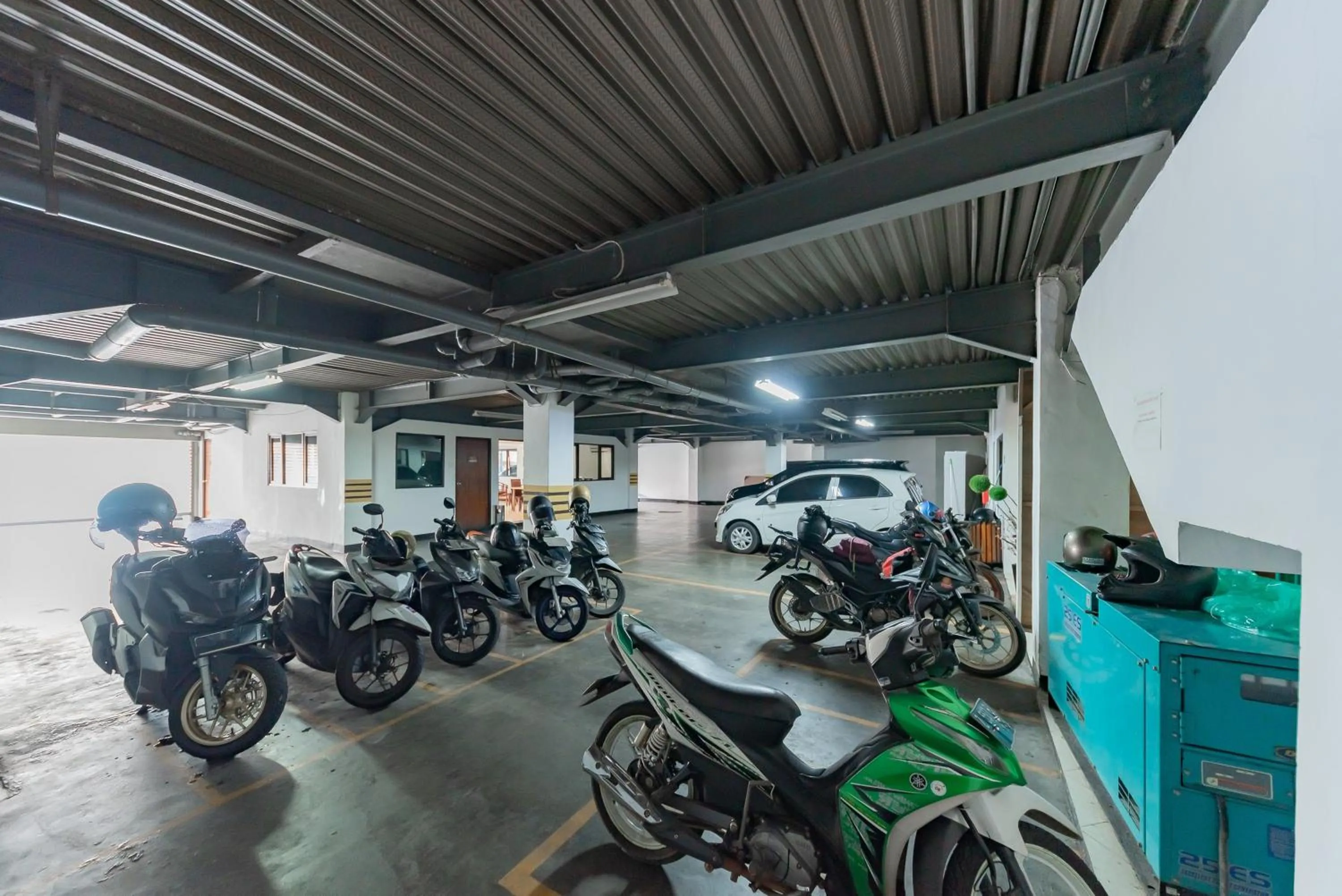 Parking in RedDoorz Plus at Buah Batu