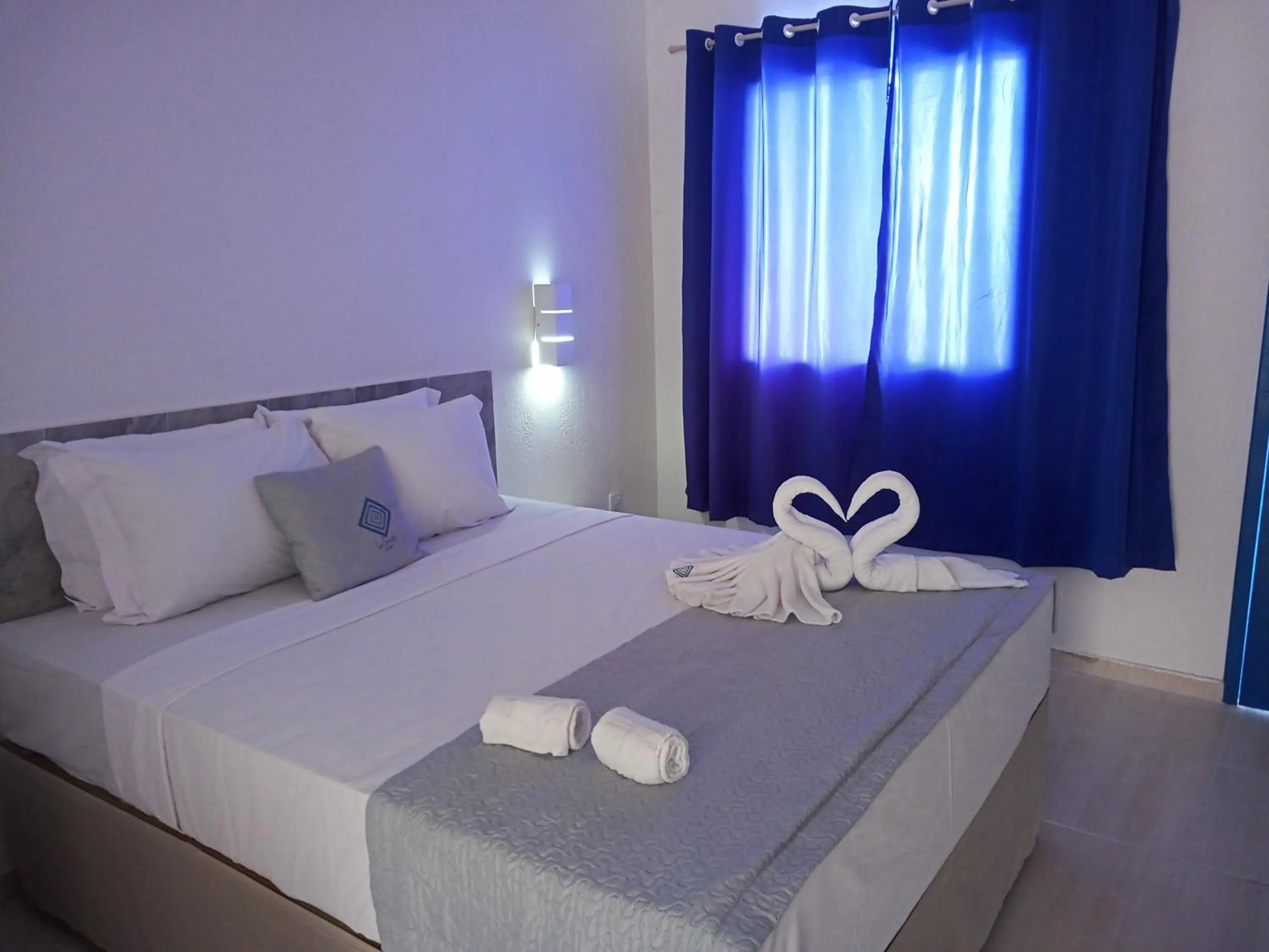 Bedroom, Bed in La Suite Praia Hotel