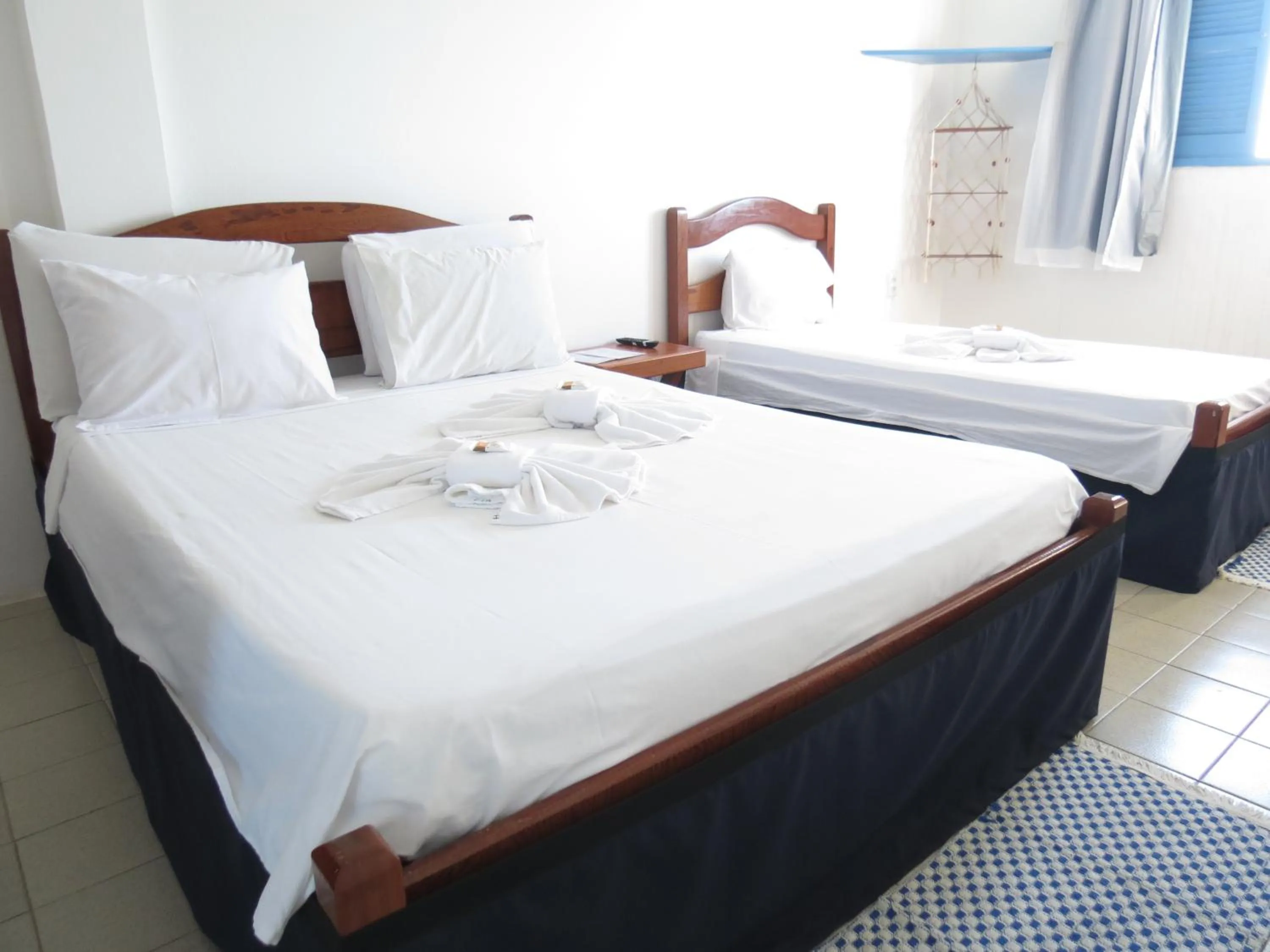 Photo of the whole room, Bed in La Suite Praia Hotel