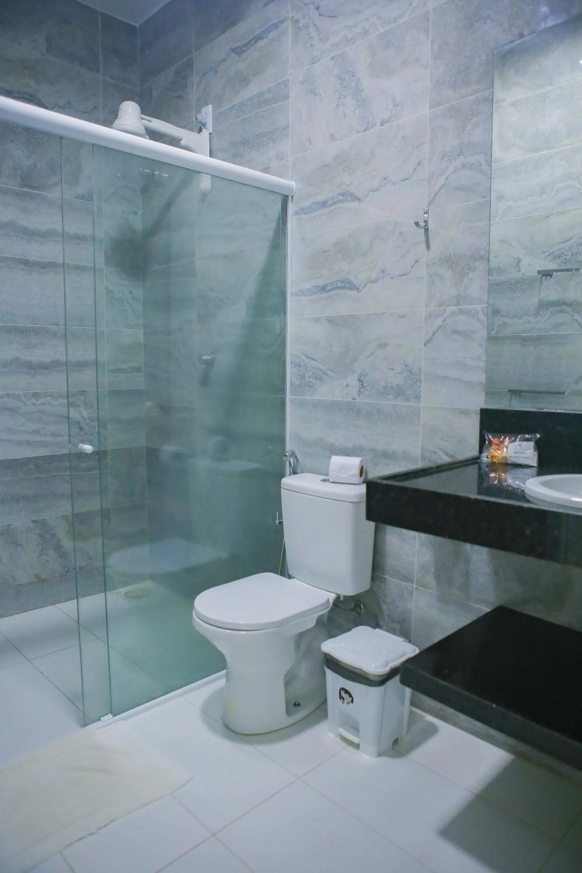 Bathroom in La Suite Praia Hotel