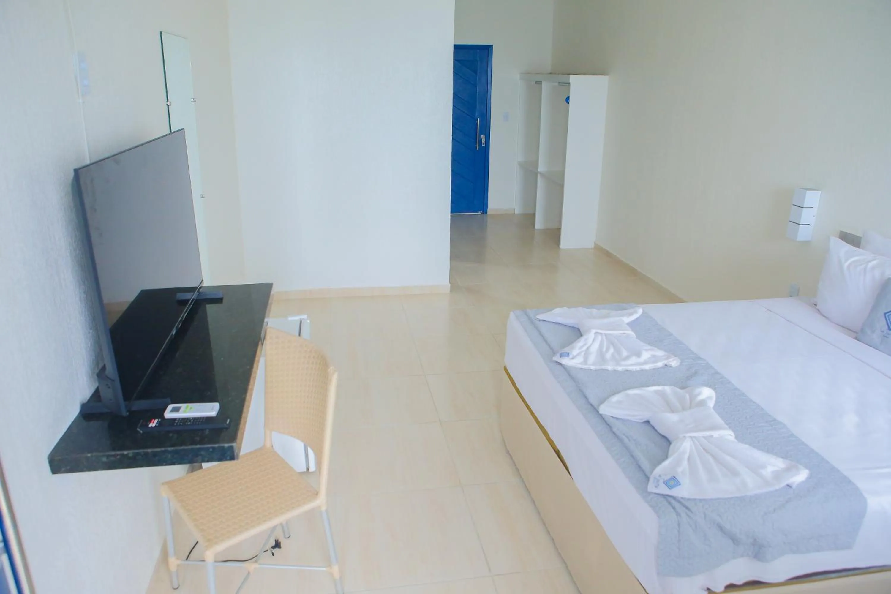 Photo of the whole room, Bed in La Suite Praia Hotel