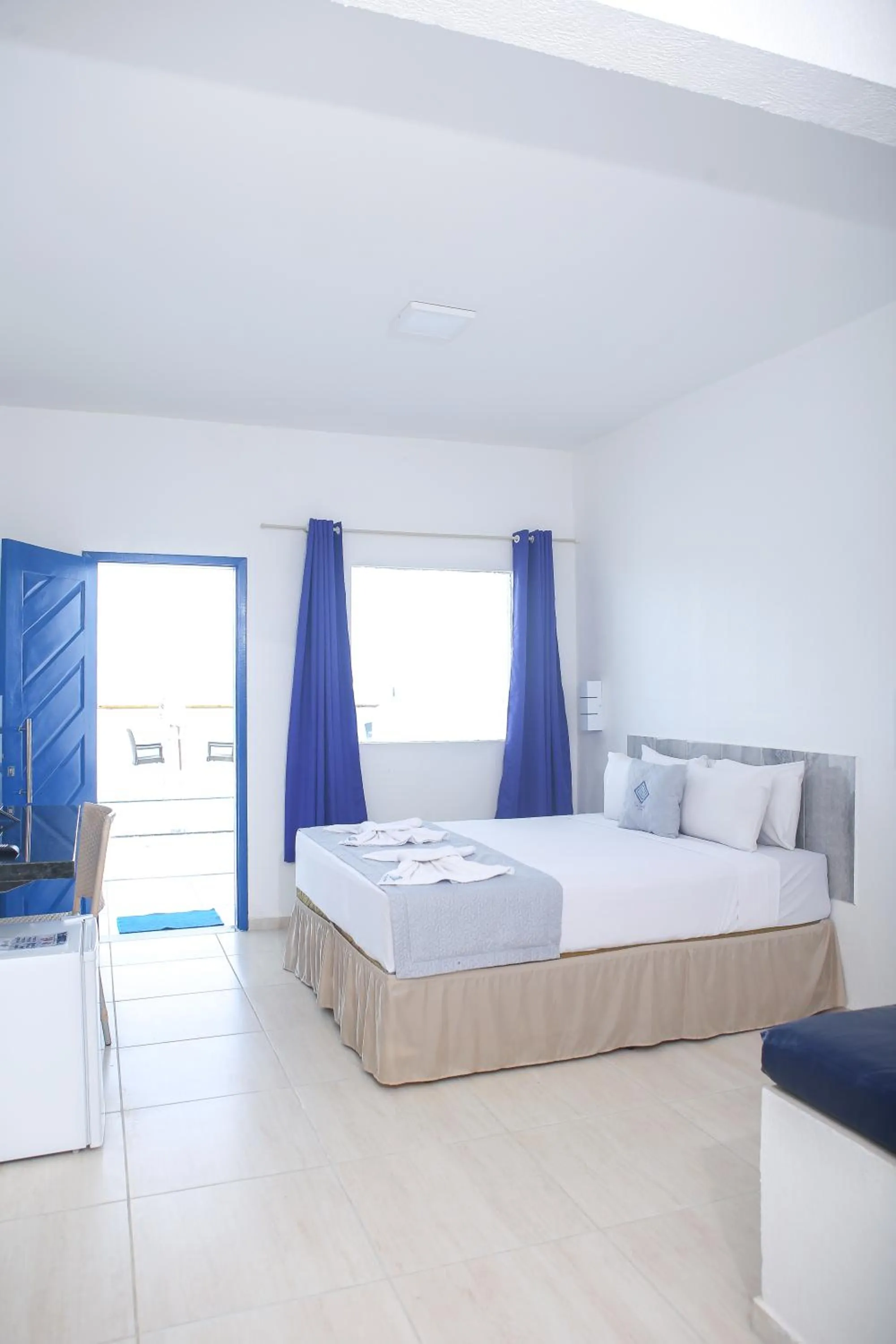 Property building, Bed in La Suite Praia Hotel