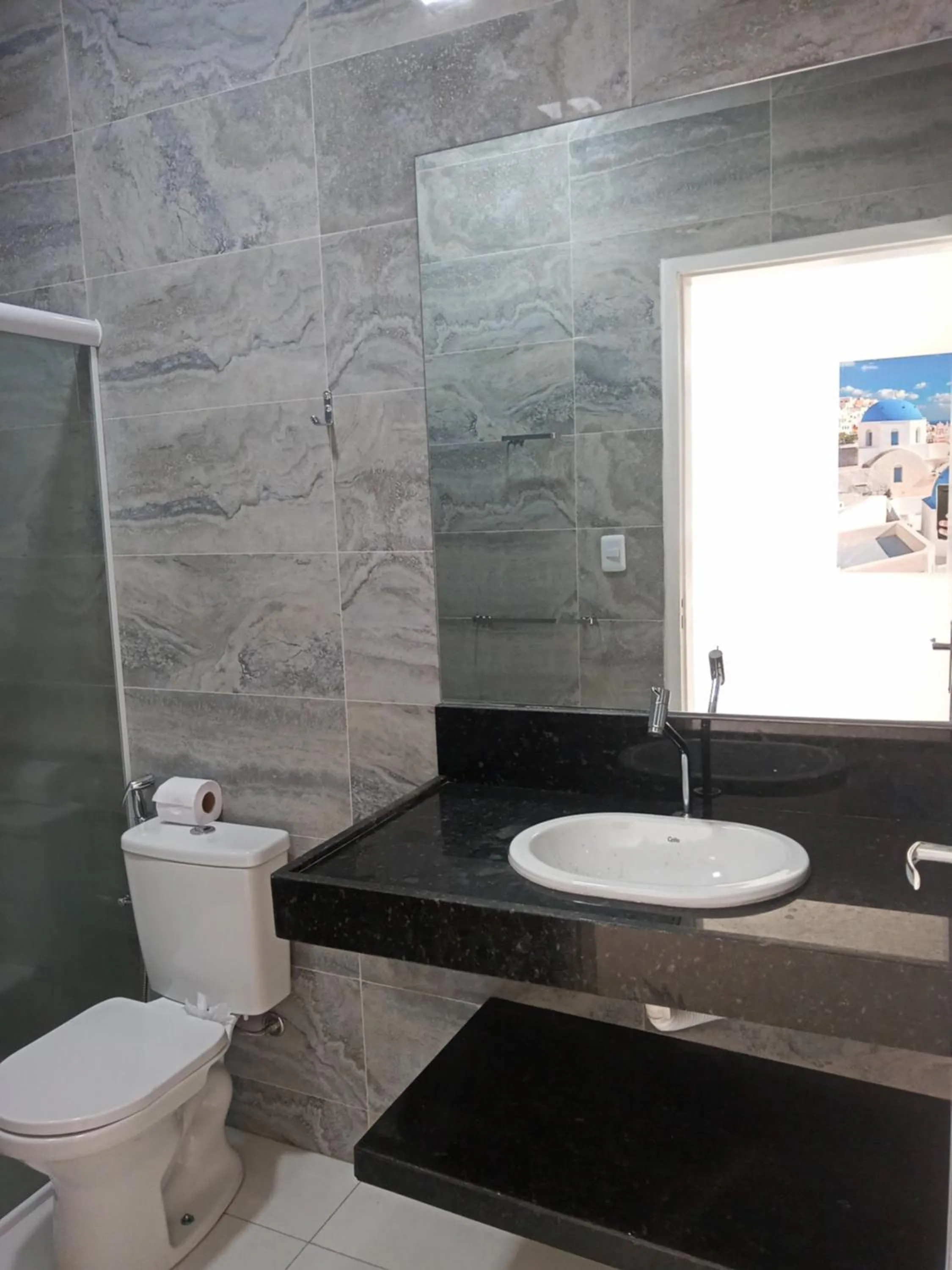 Bathroom in La Suite Praia Hotel