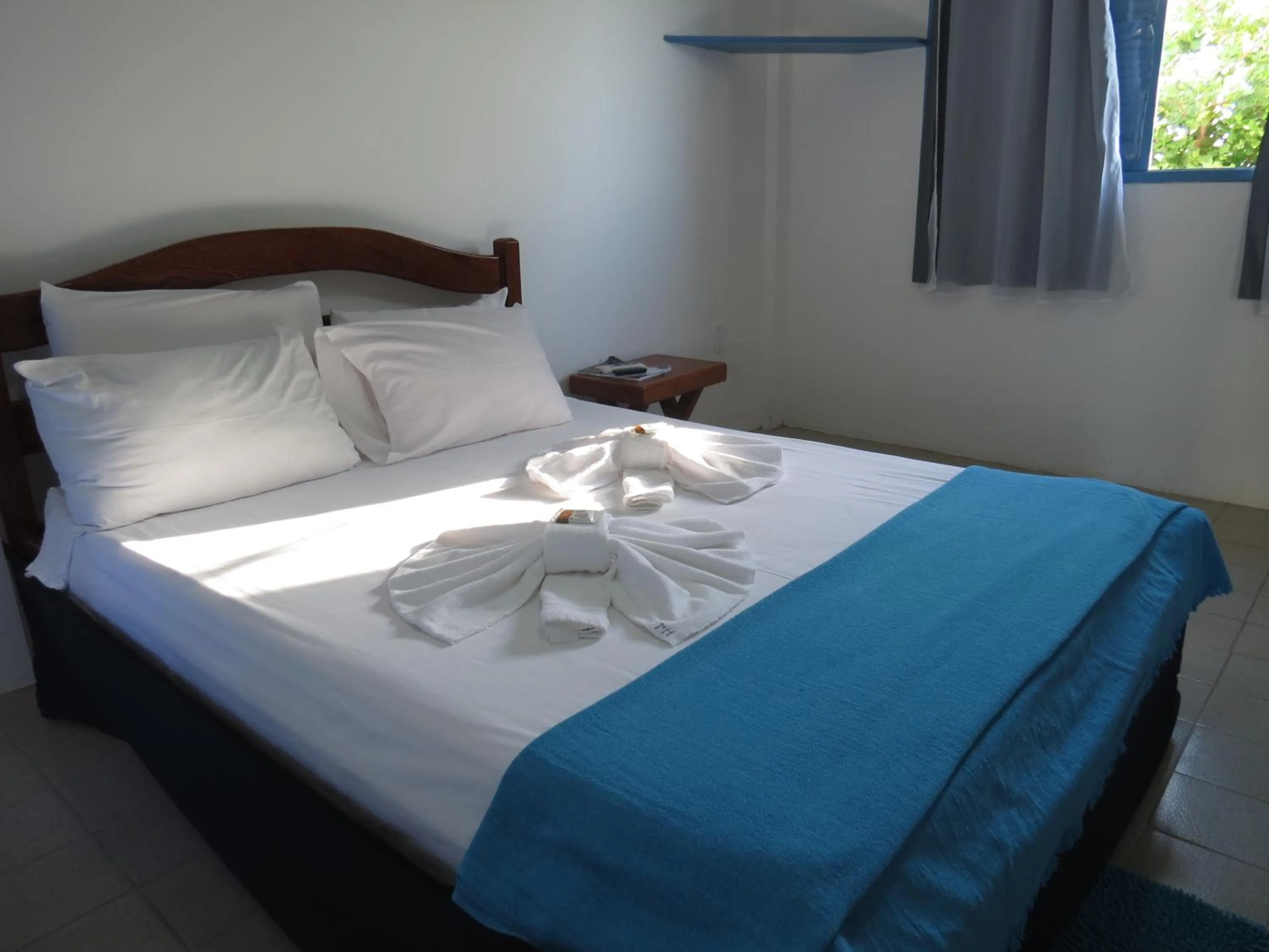 Photo of the whole room, Bed in La Suite Praia Hotel