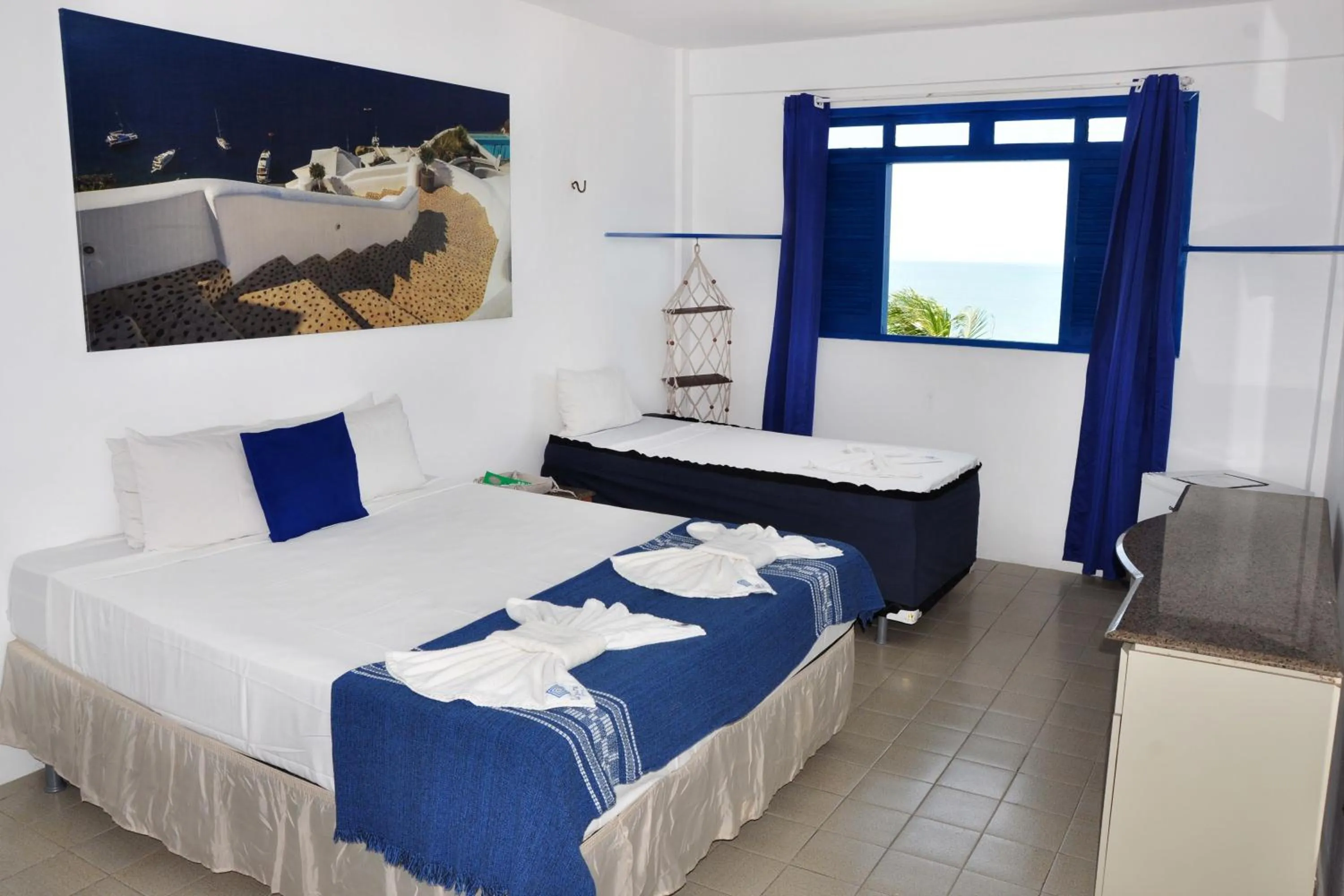 Photo of the whole room, Bed in La Suite Praia Hotel