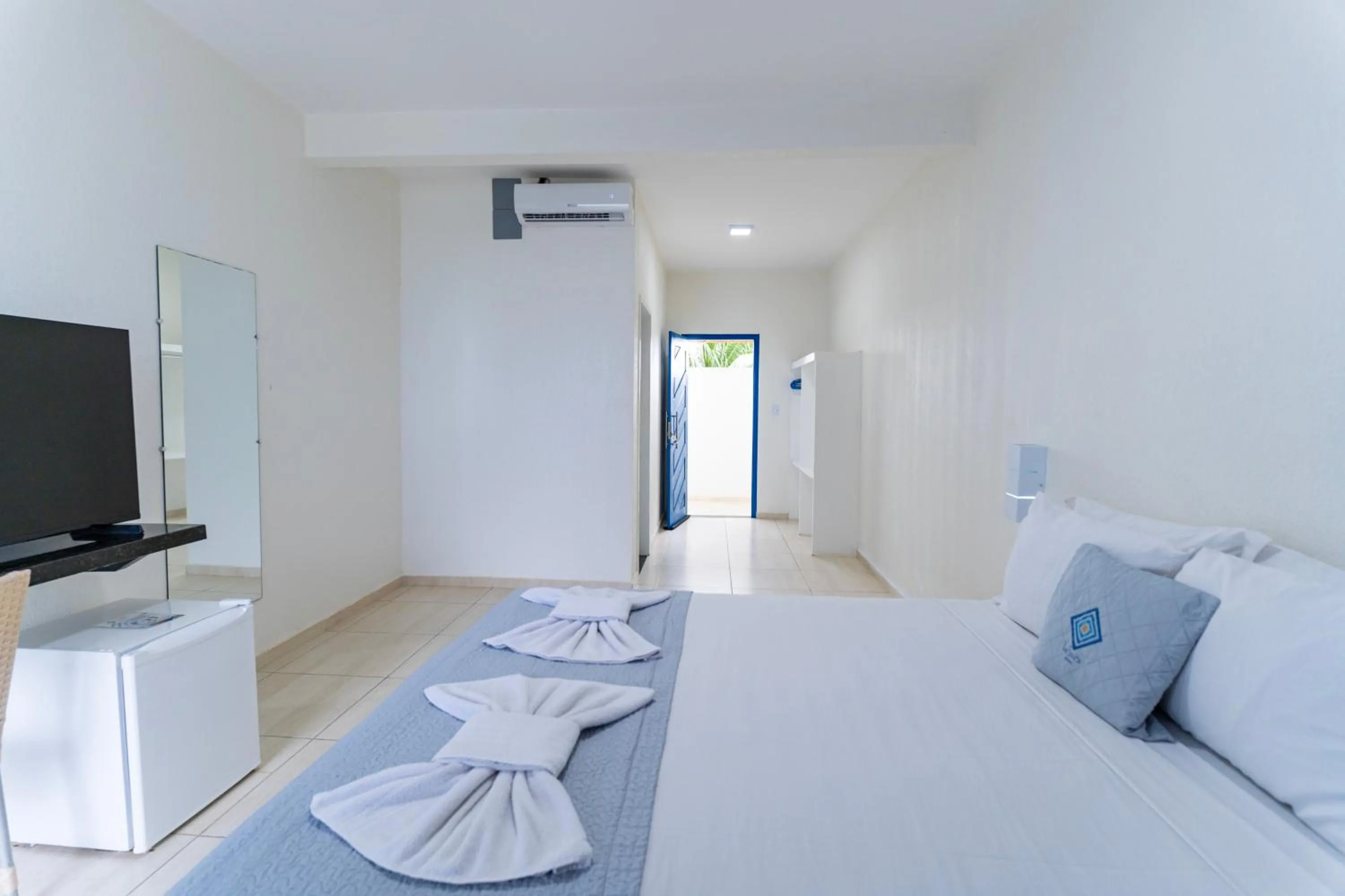 Bed in La Suite Praia Hotel