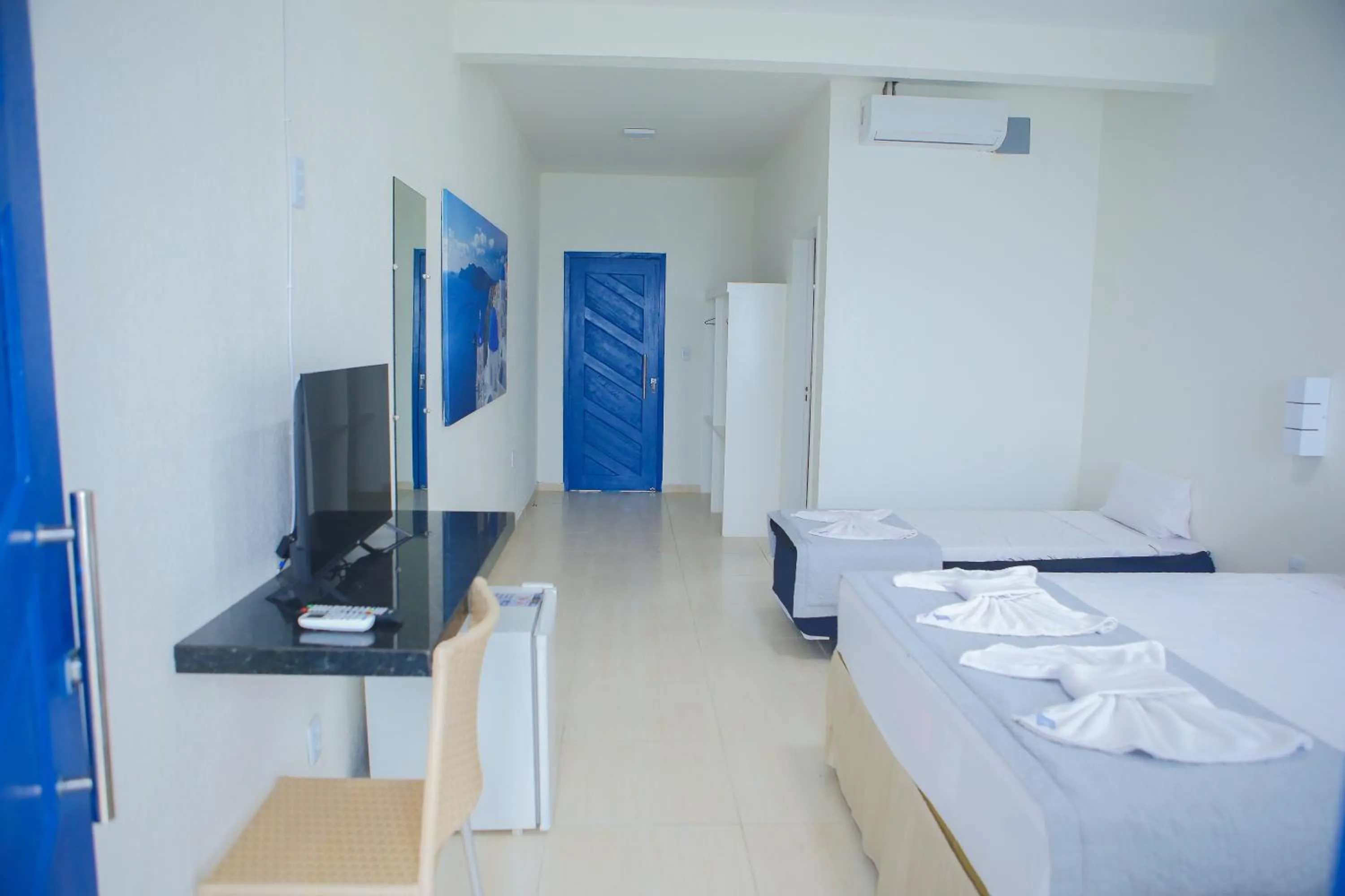 Photo of the whole room, Bed in La Suite Praia Hotel