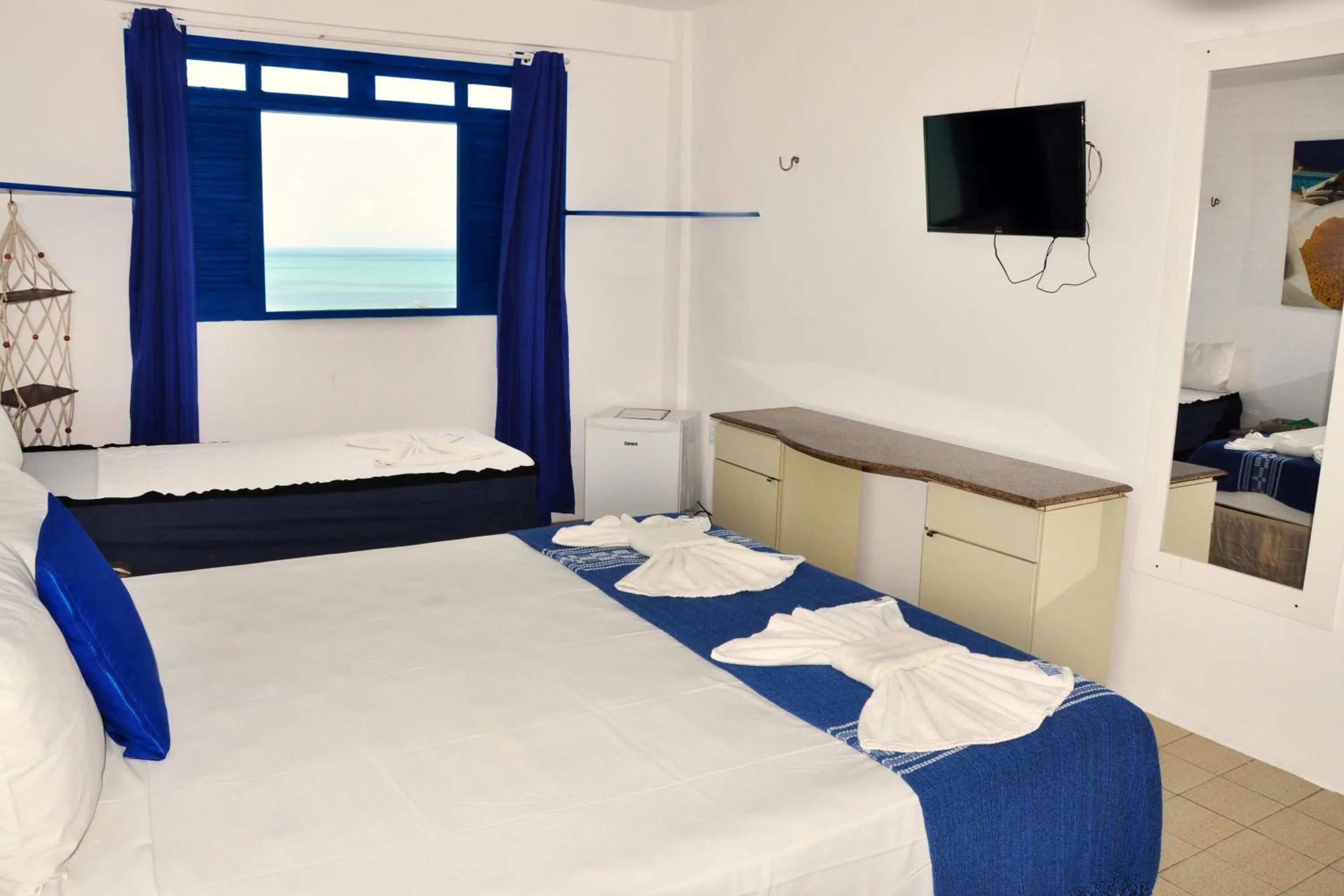 Photo of the whole room, Bed in La Suite Praia Hotel