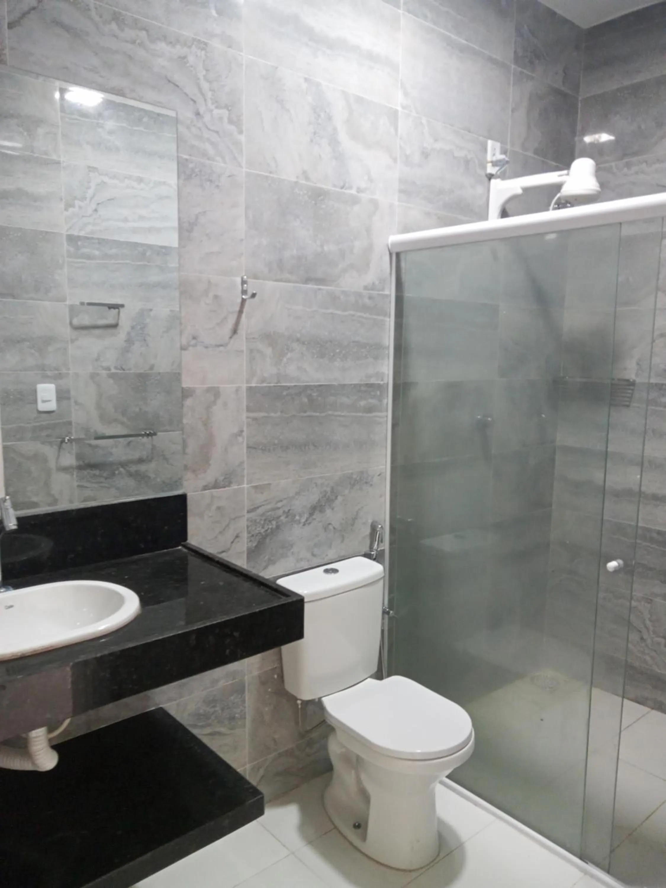 Bathroom in La Suite Praia Hotel