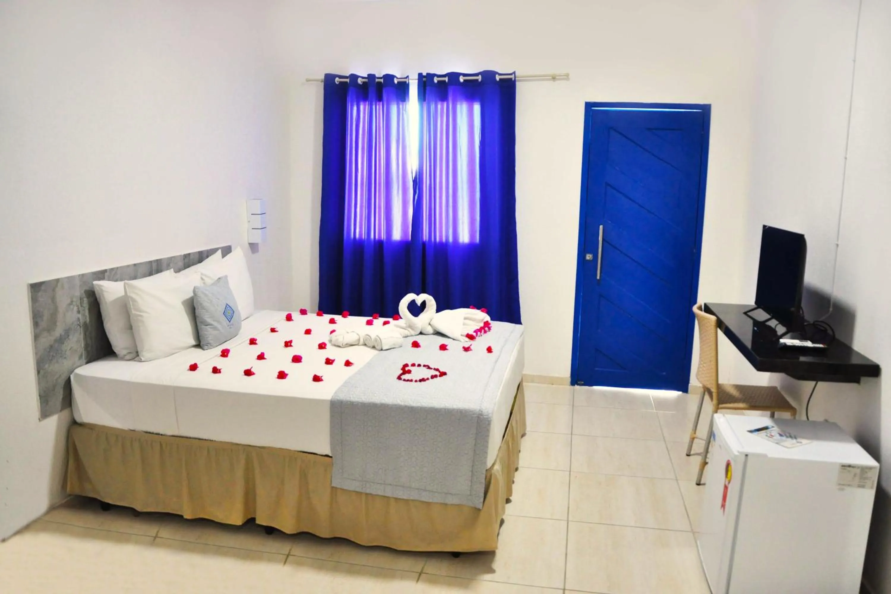 Photo of the whole room, Bed in La Suite Praia Hotel