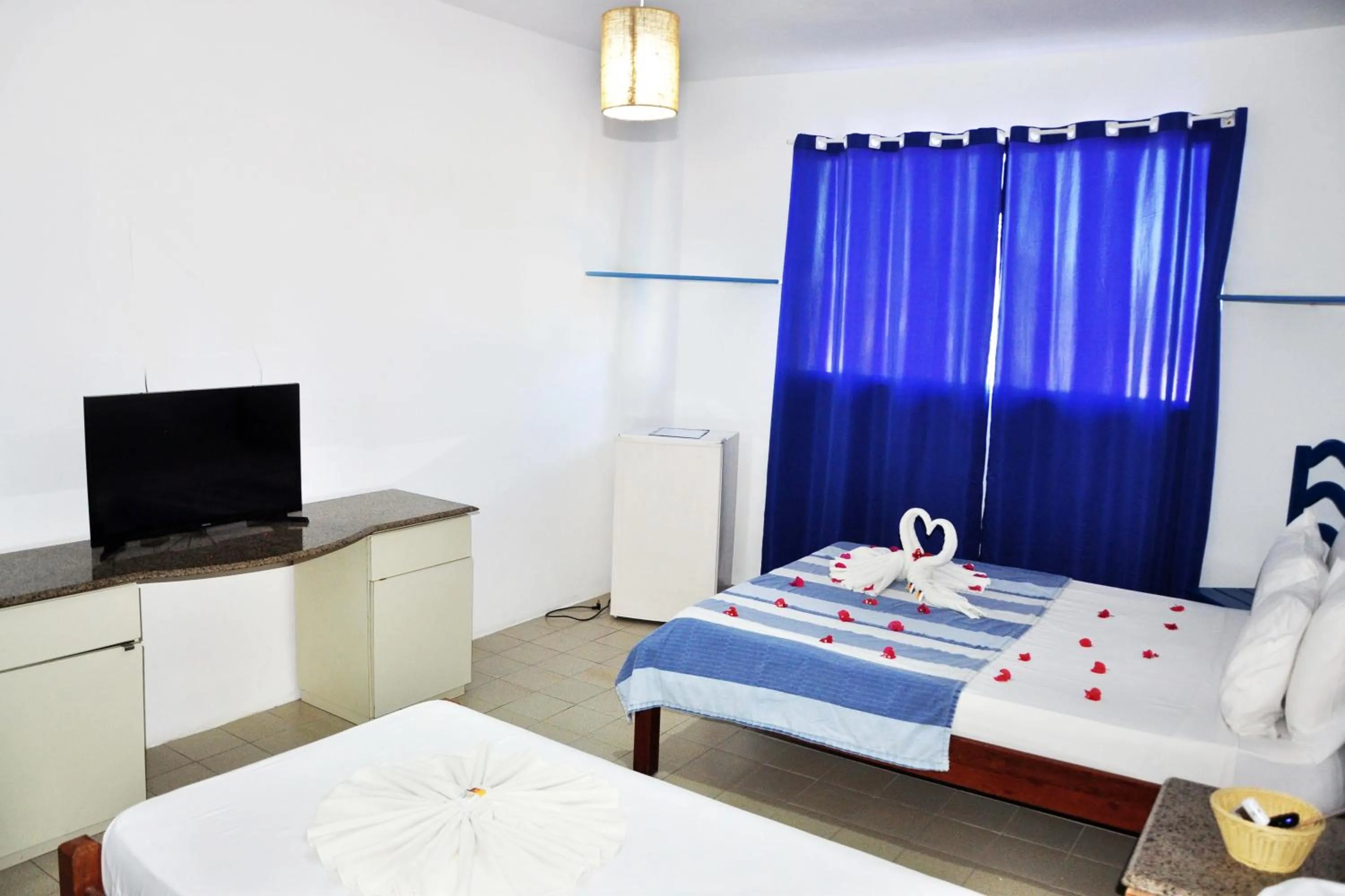 Photo of the whole room, Bed in La Suite Praia Hotel