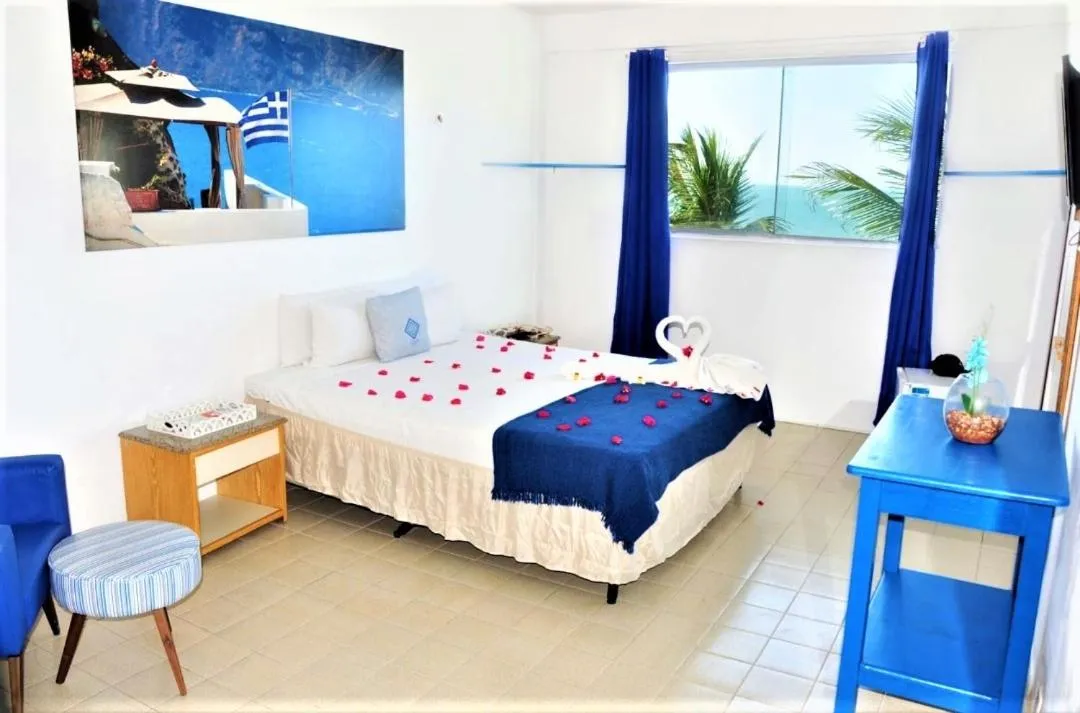 Bed in La Suite Praia Hotel