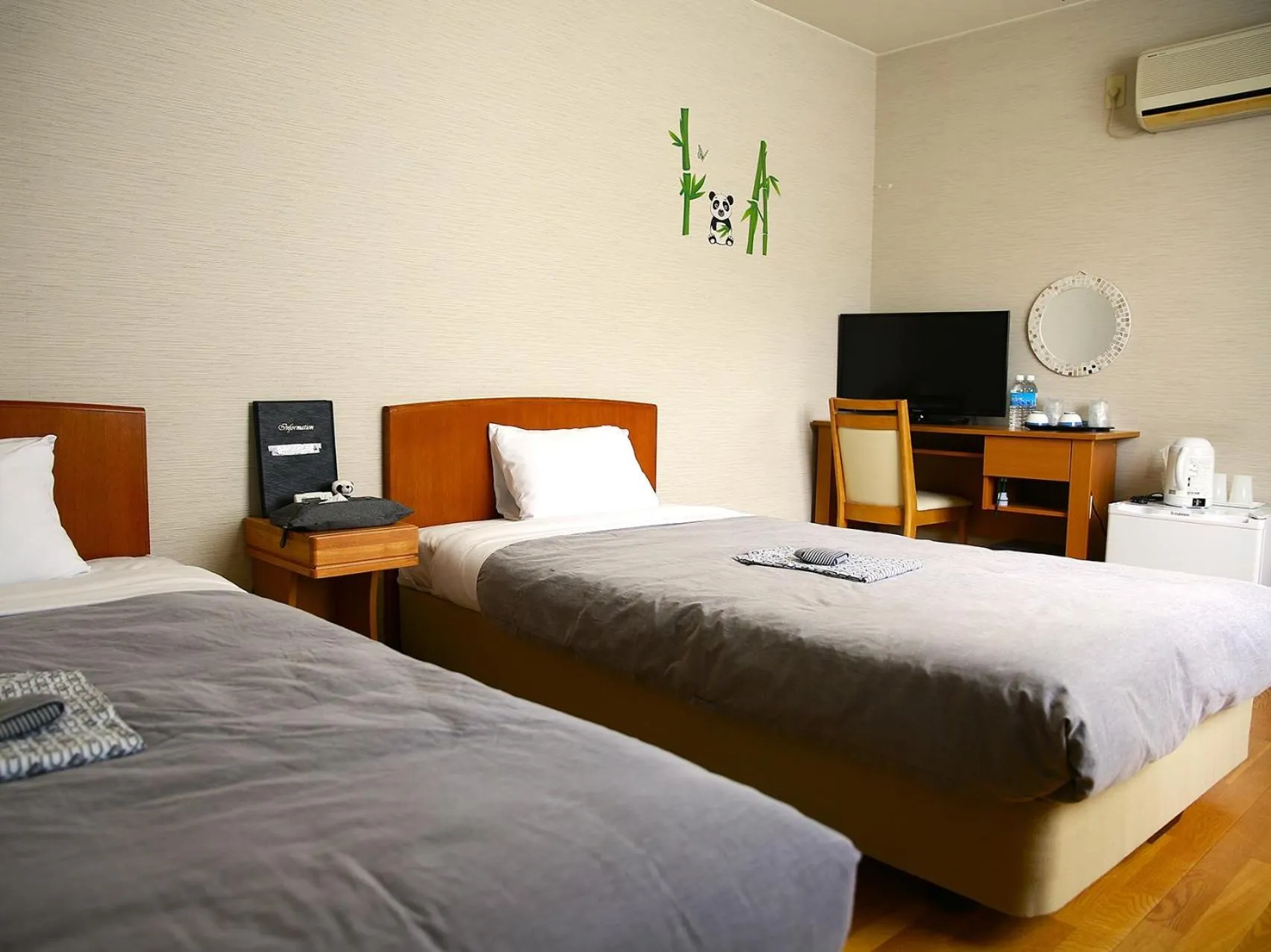 Bed in Shinnishiki Hotel