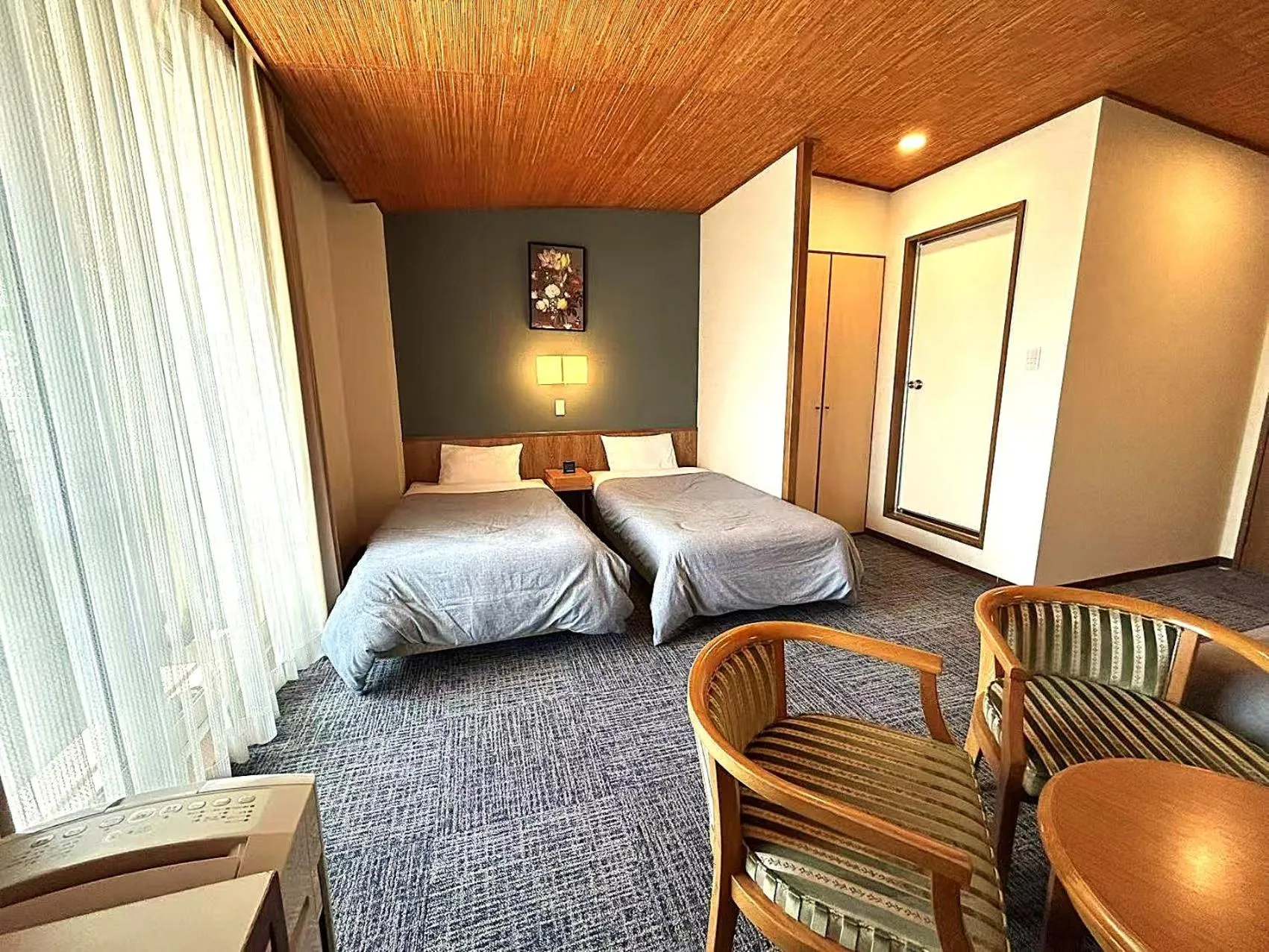 Bed in Shinnishiki Hotel