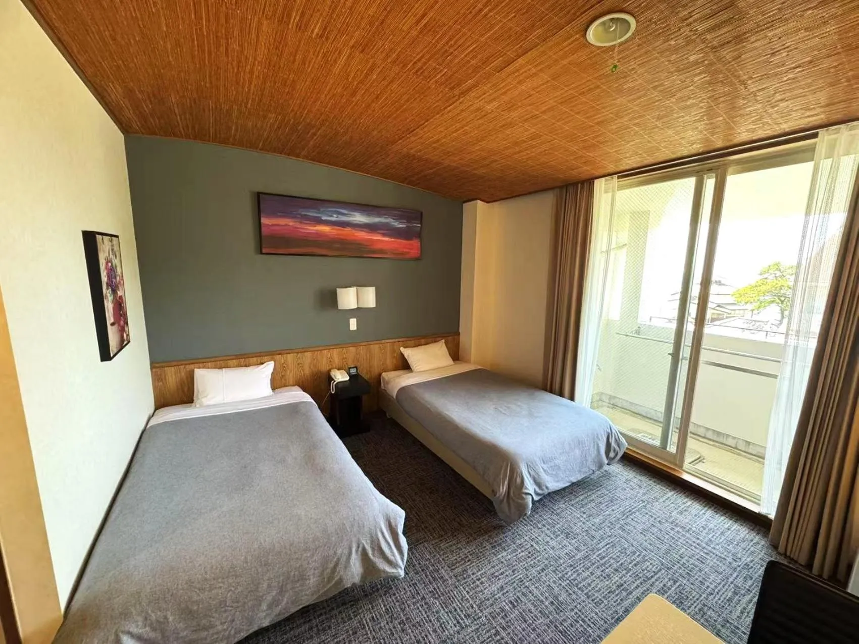 Bed in Shinnishiki Hotel