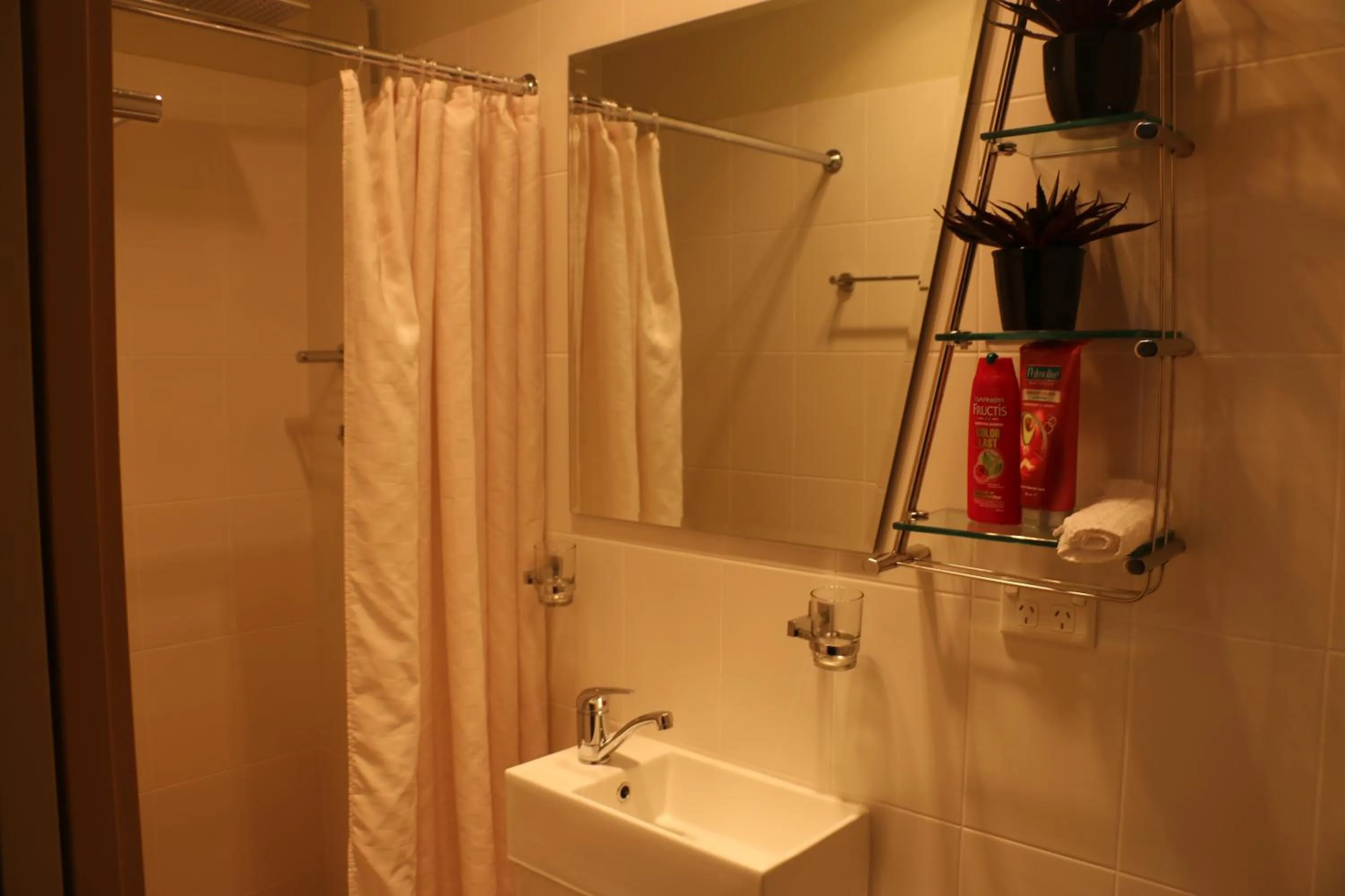 Shower in Westside Studio Apartments