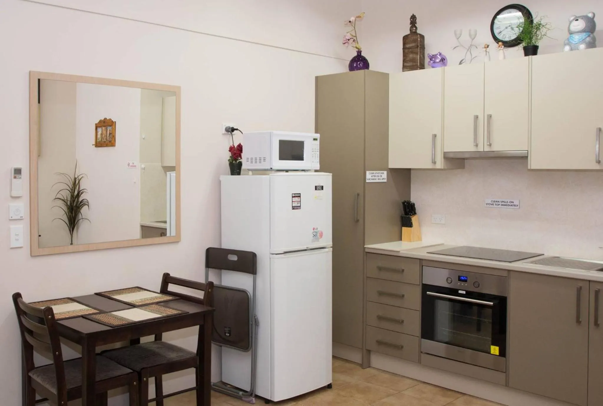 Kitchen or kitchenette in Westside Studio Apartments