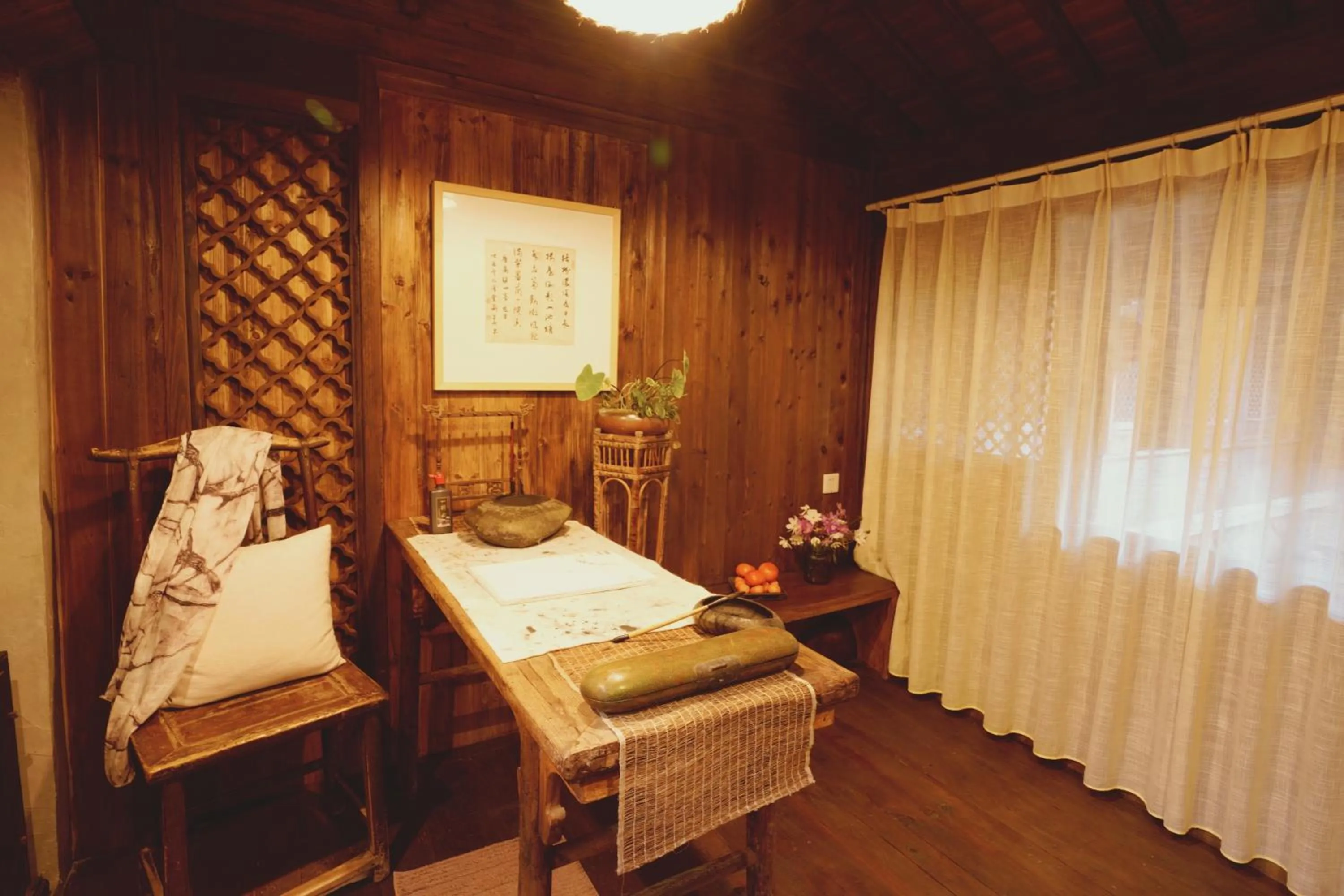 Bed in WuYuan QiYe YanXiang Guesthouse