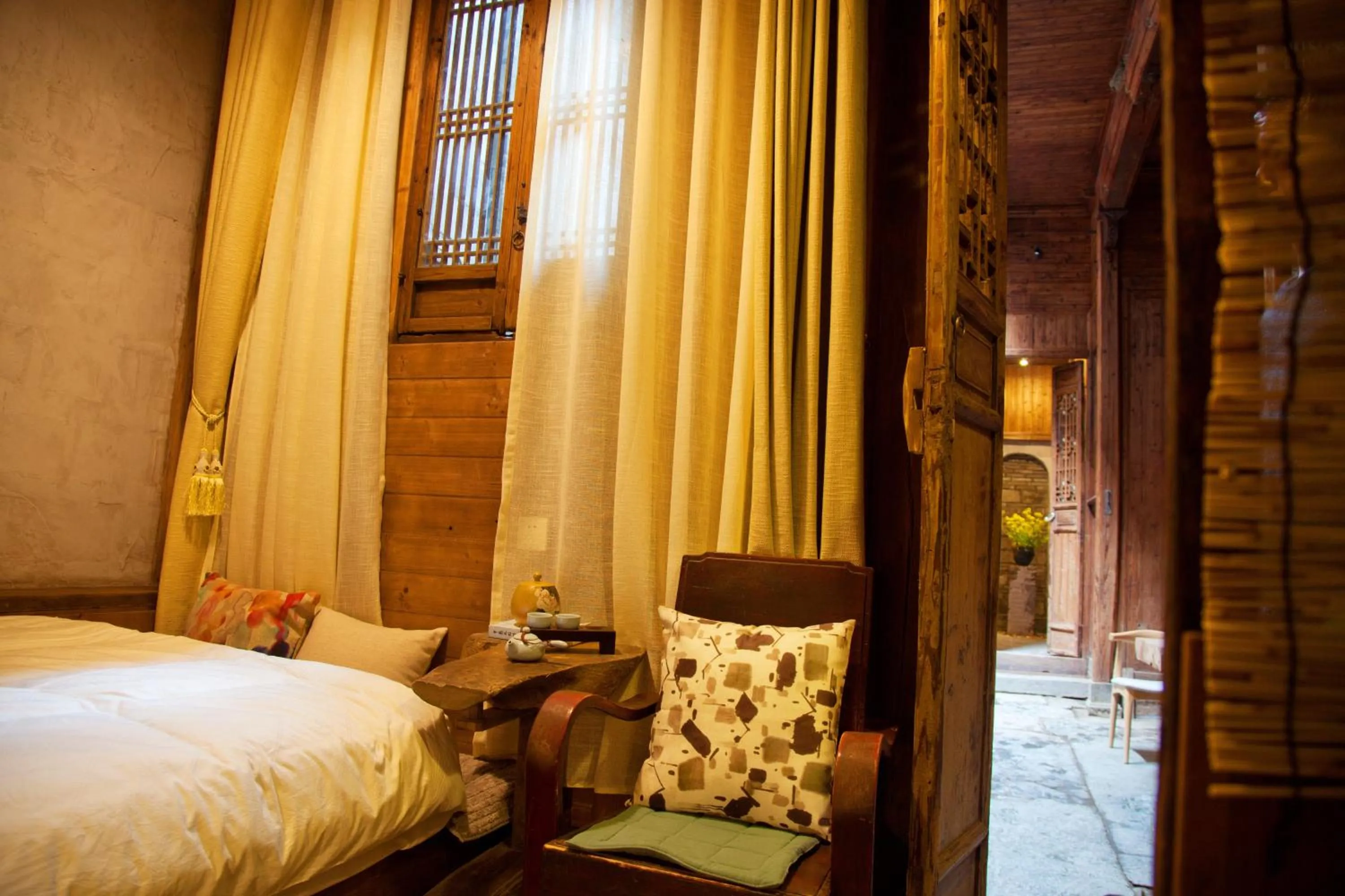 Photo of the whole room, Bed in WuYuan QiYe YanXiang Guesthouse