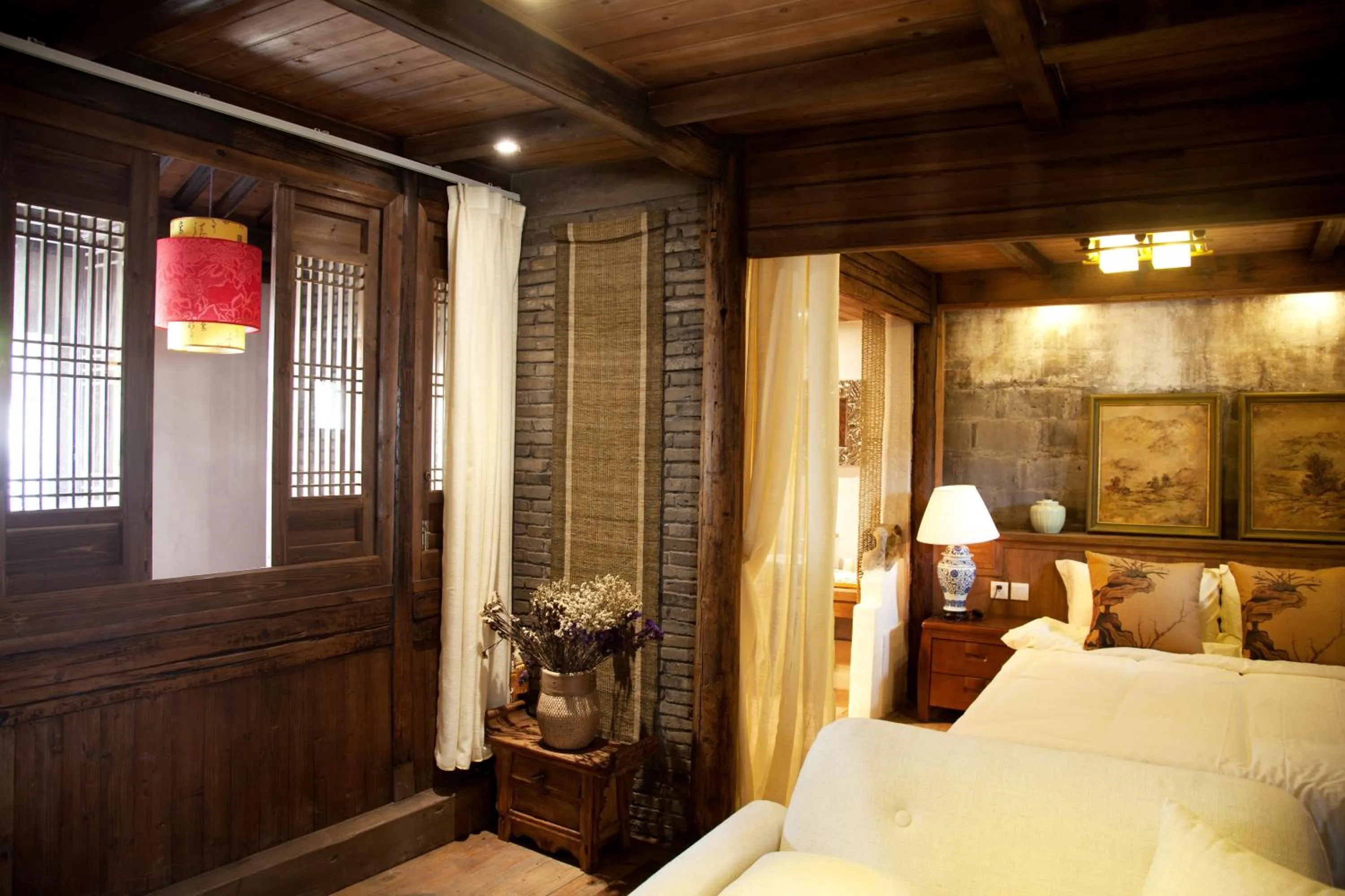 Photo of the whole room, Bed in WuYuan QiYe YanXiang Guesthouse