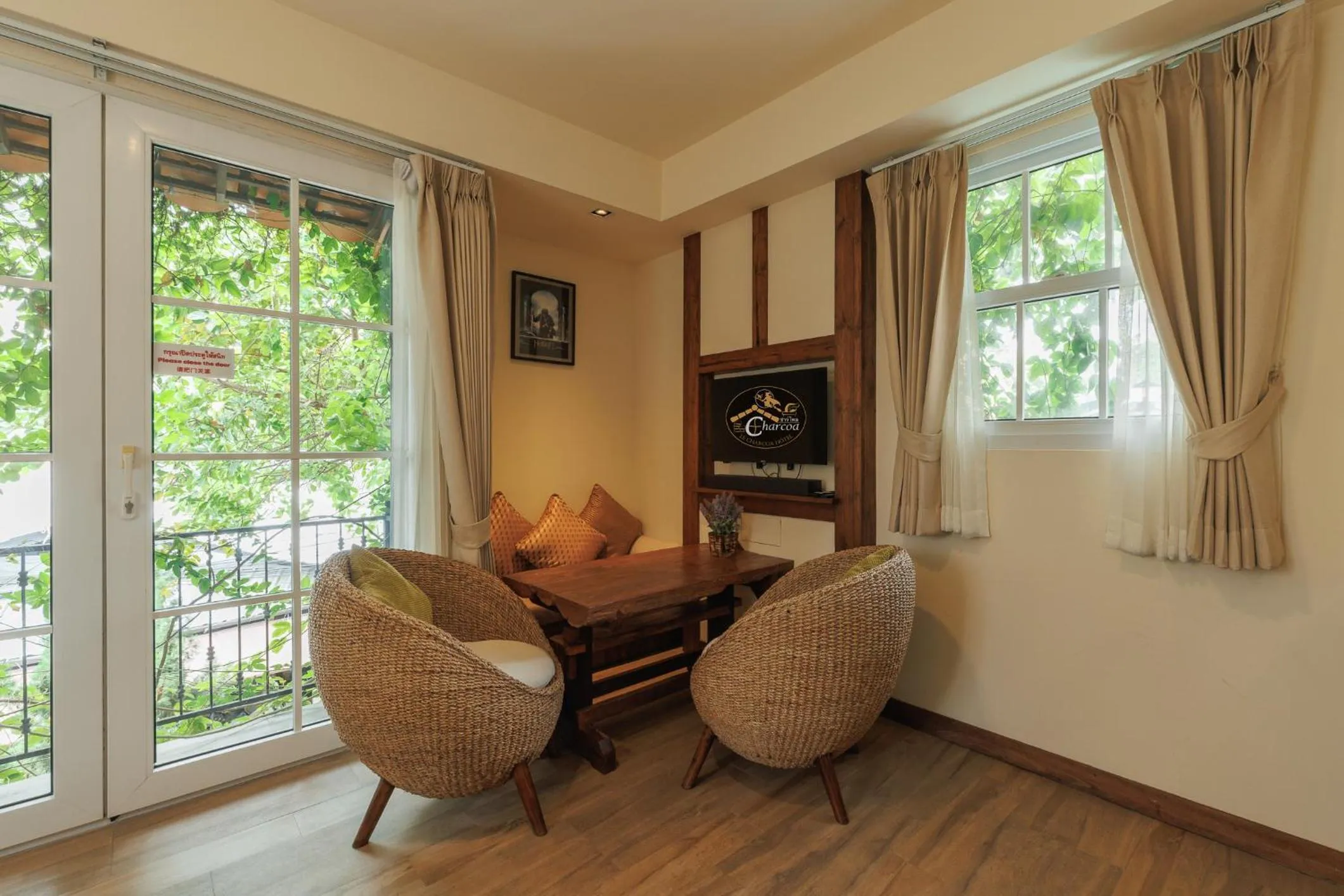 Seating area in Le Charcoa Hotel