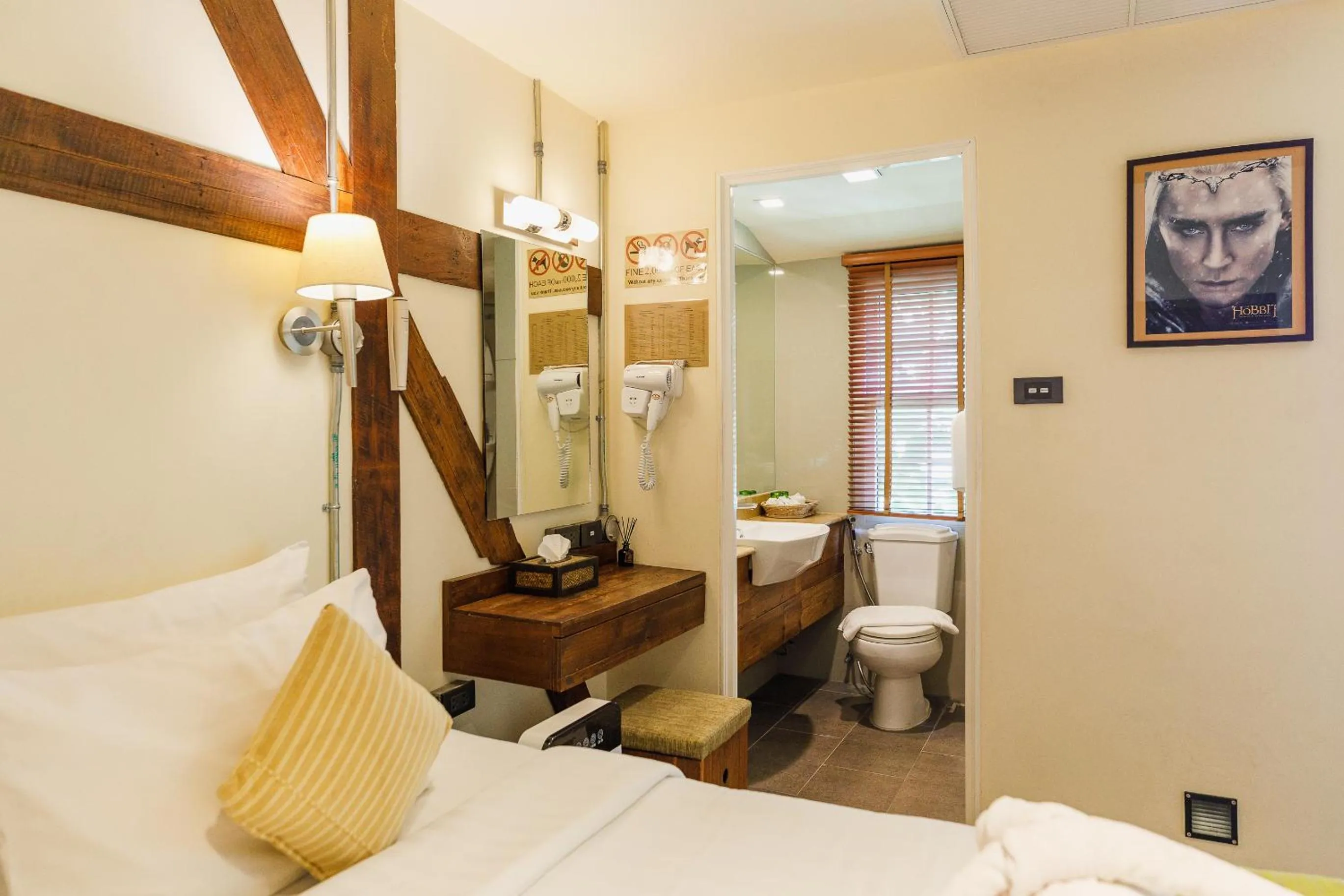 Bedroom in Le Charcoa Hotel