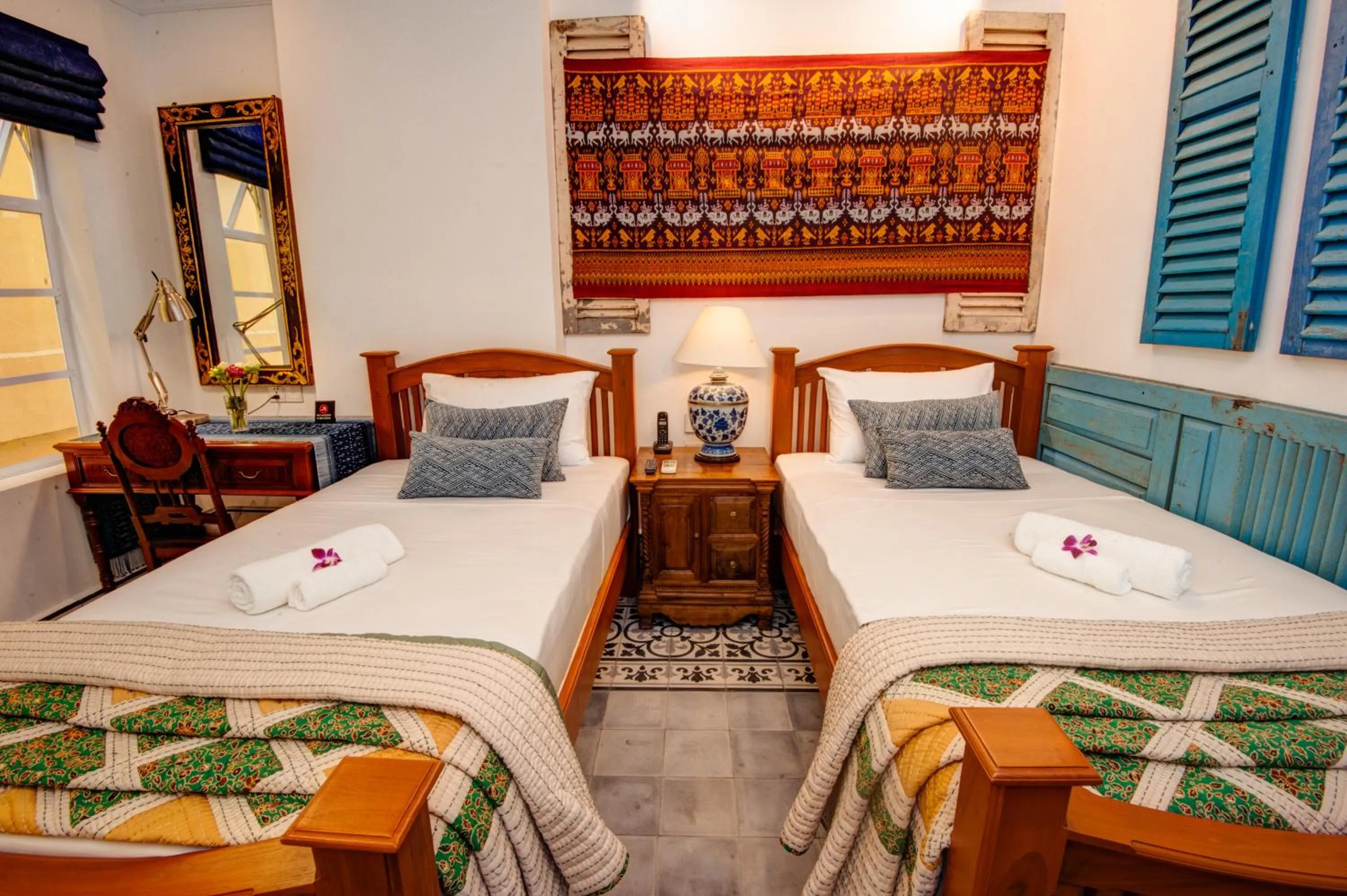 Bed in Khmer Surin Boutique Guesthouse