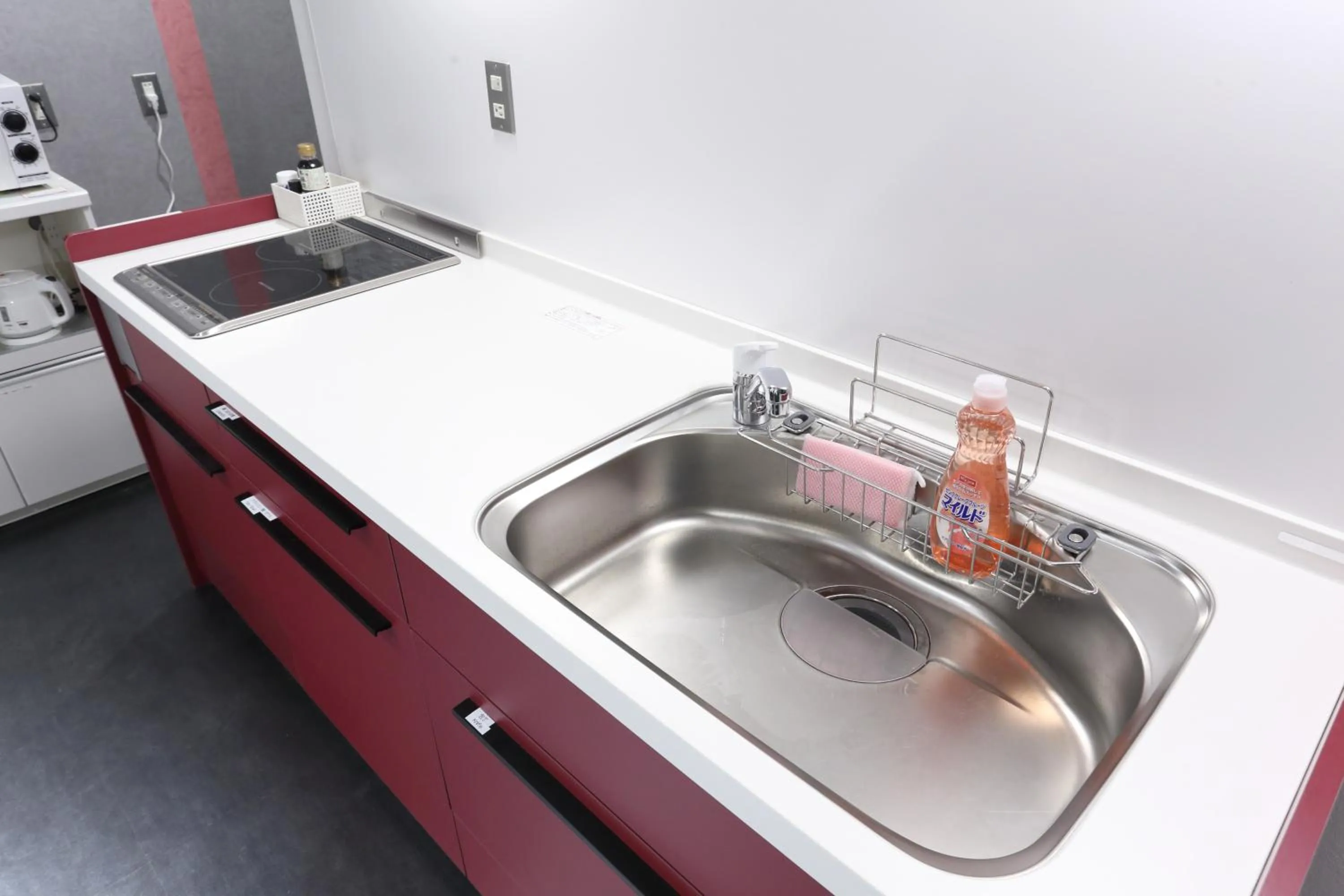 Communal kitchen in Oak Hotel Edo