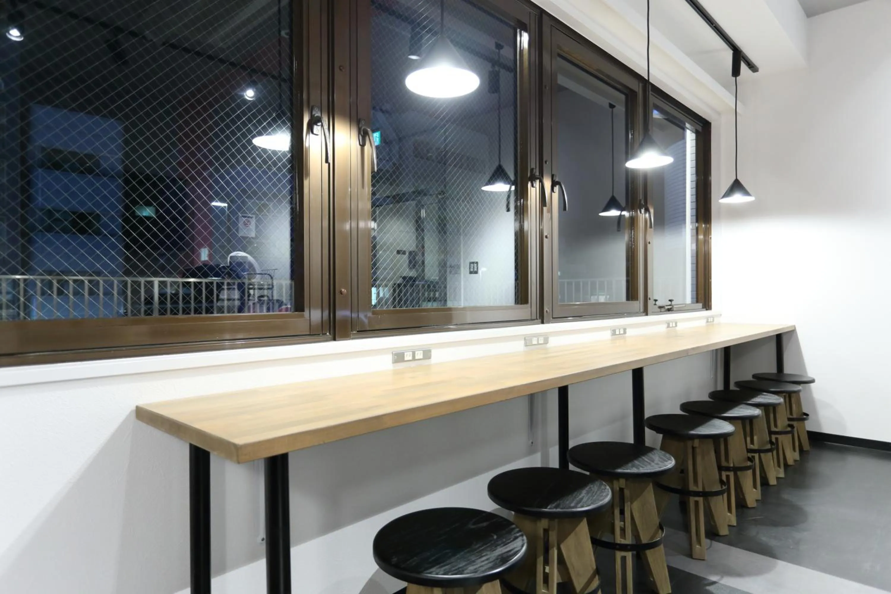 Communal lounge/ TV room in Oak Hotel Edo