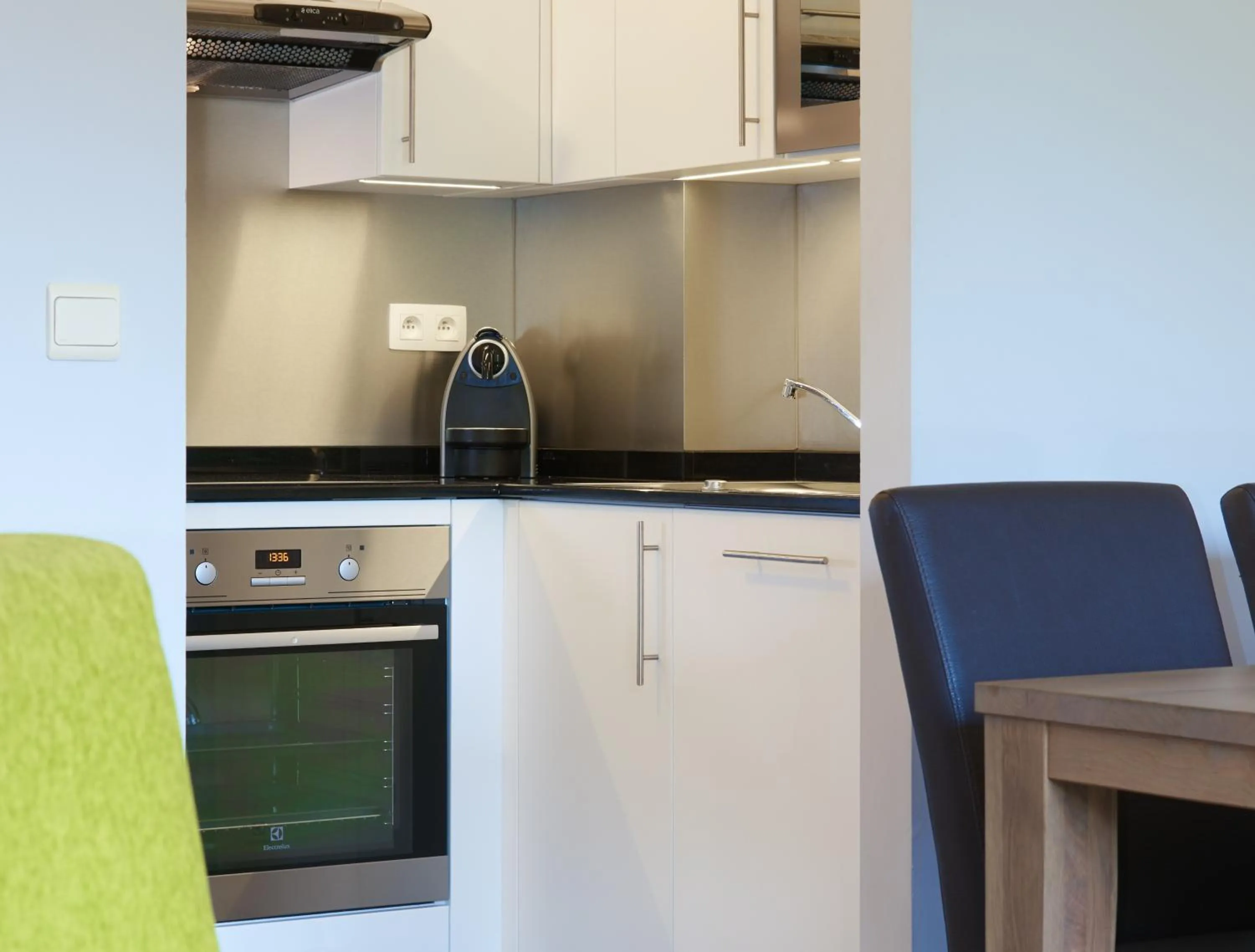 Kitchen or kitchenette in Thon Hotel Residence Parnasse Aparthotel