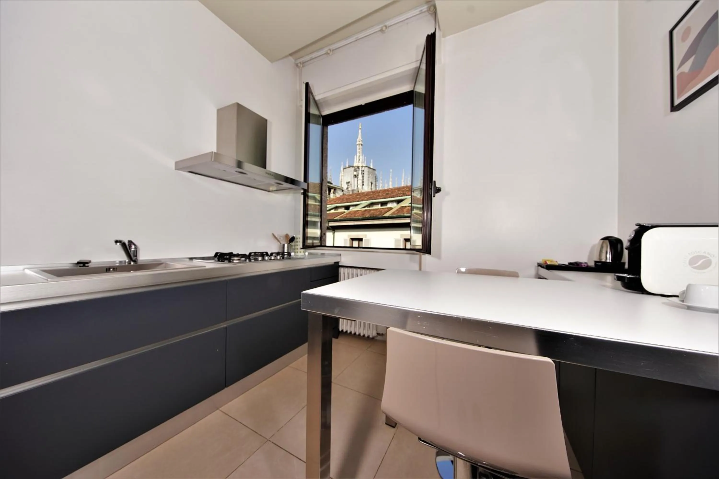 Kitchen or kitchenette in Suite Santa Tecla
