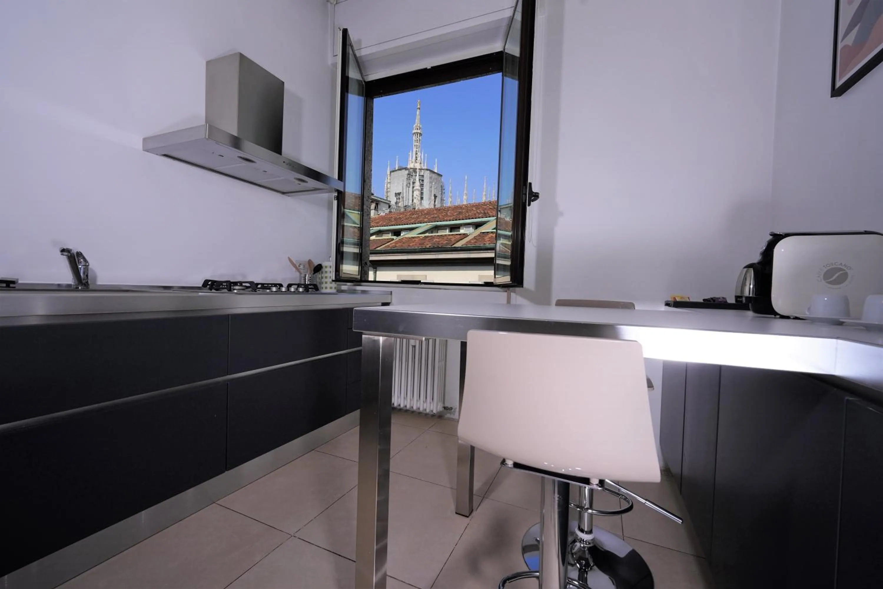 Kitchen or kitchenette in Suite Santa Tecla