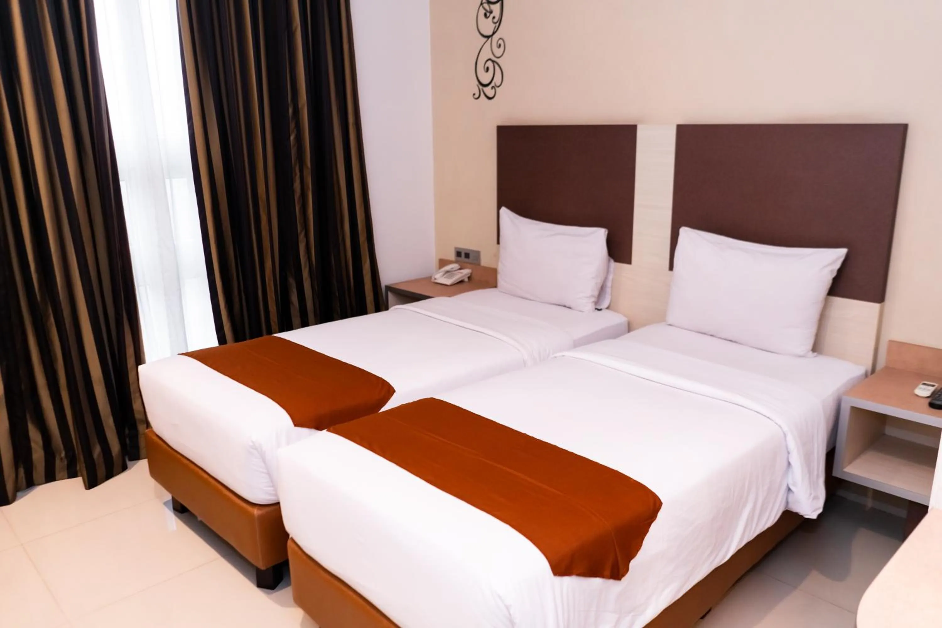 Bed in Sparks Odeon Sukabumi, ARTOTEL Curated