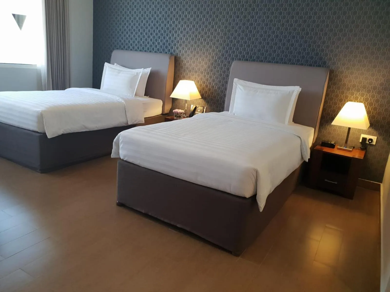 Bed in The Curve Hotel