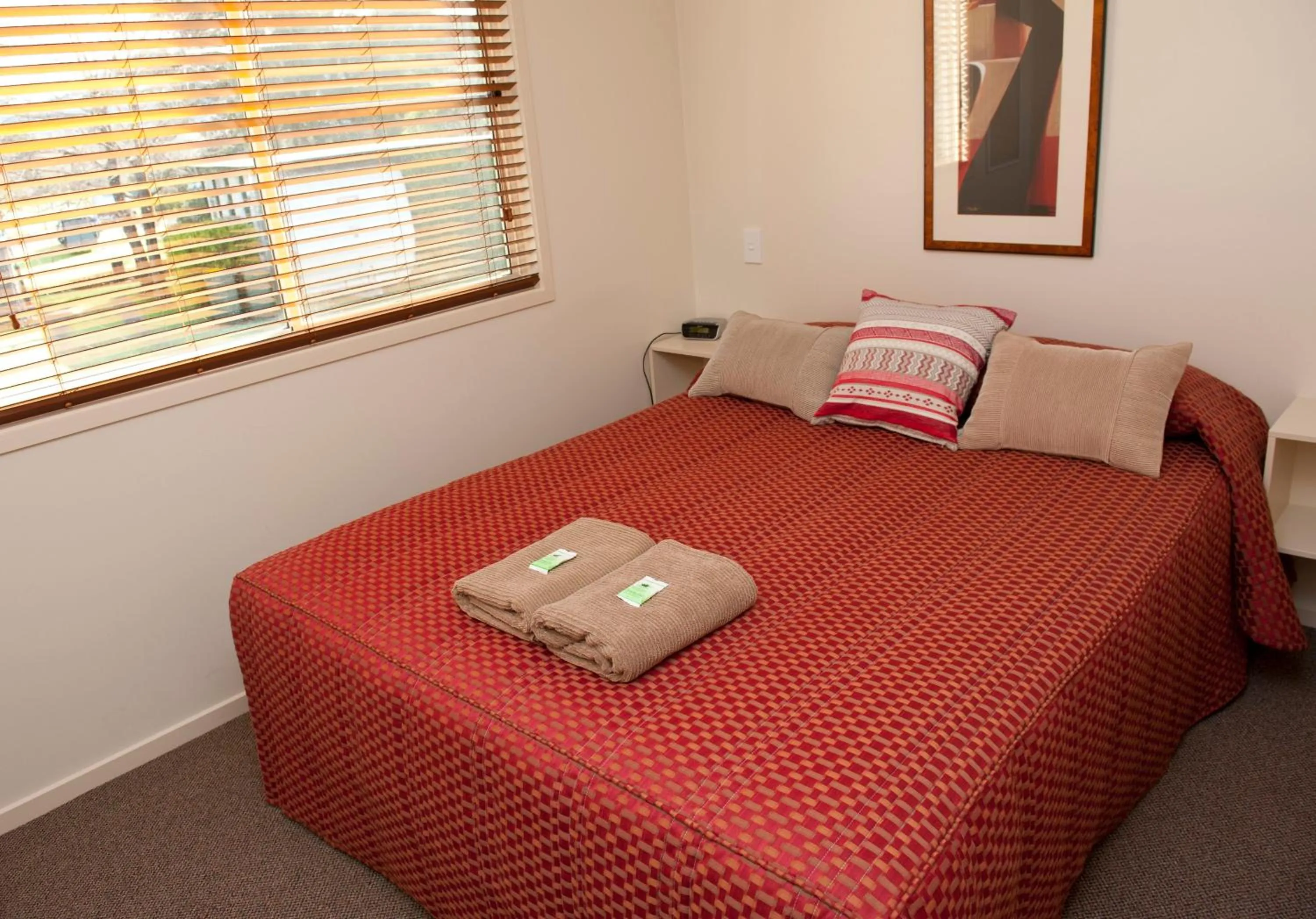 Bed in Fossickers Tourist Park