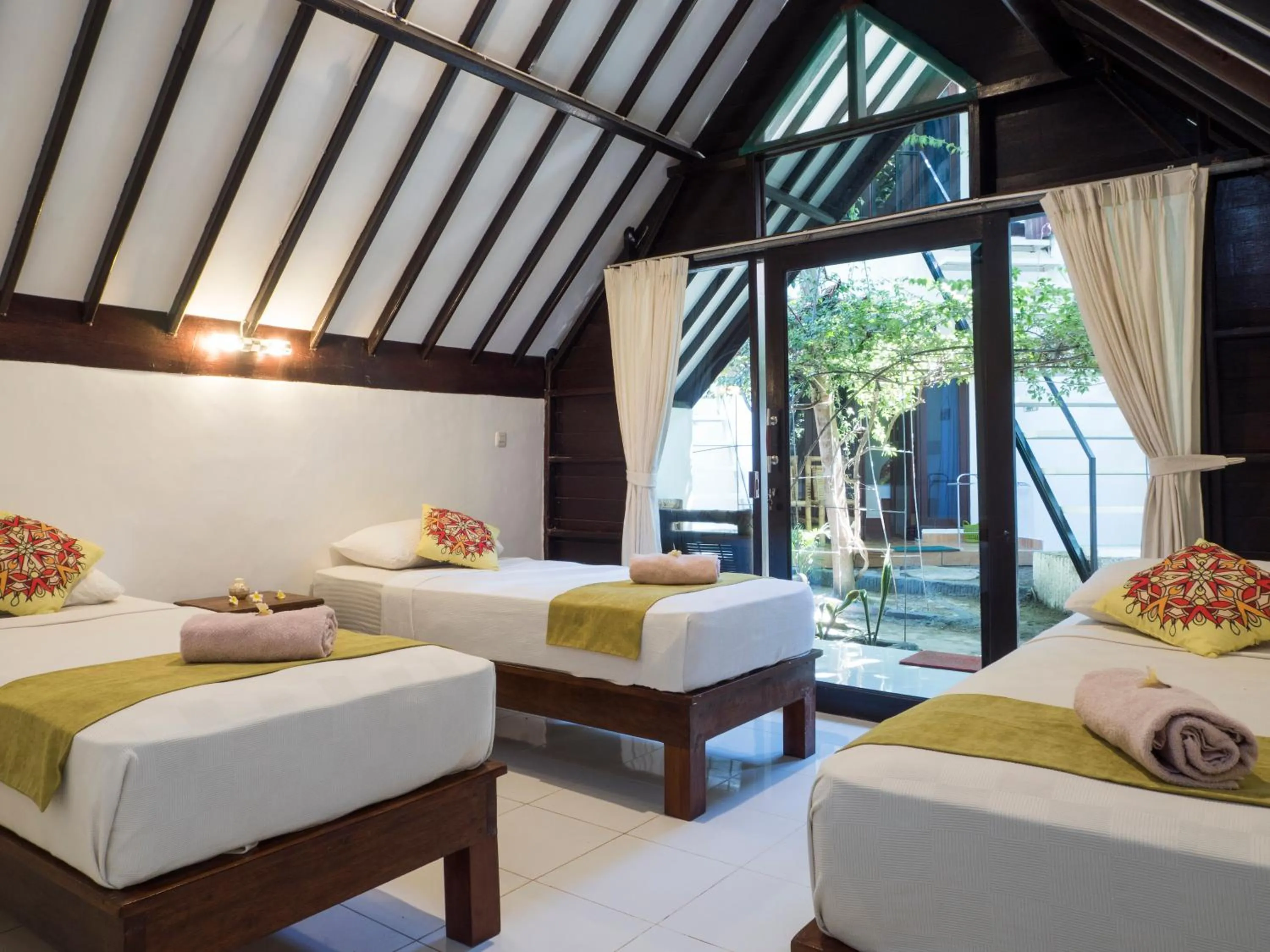Bed in Gili Turtle Beach Resort